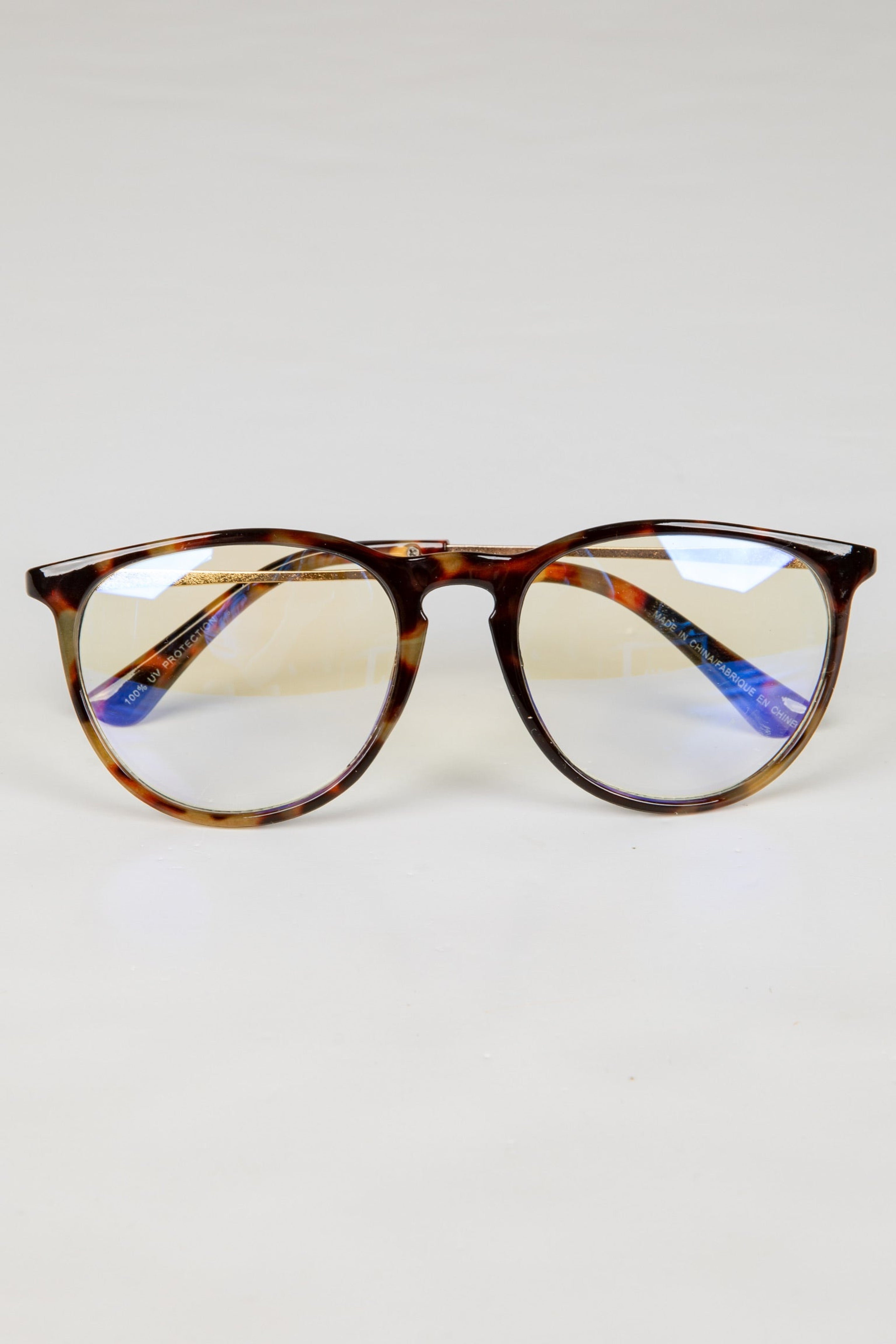 Tortoiseshell glasses on a white background