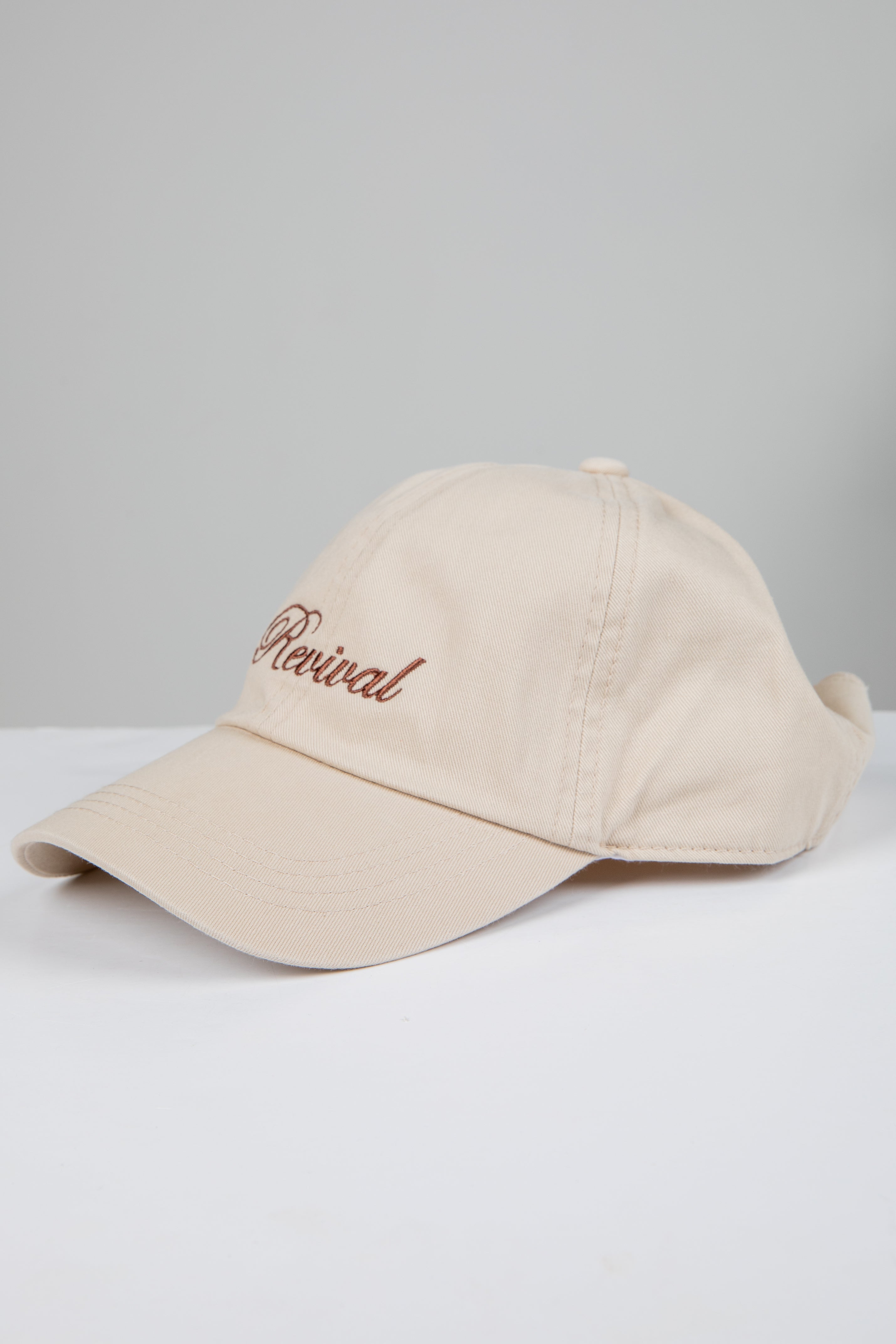 Beige cap with &