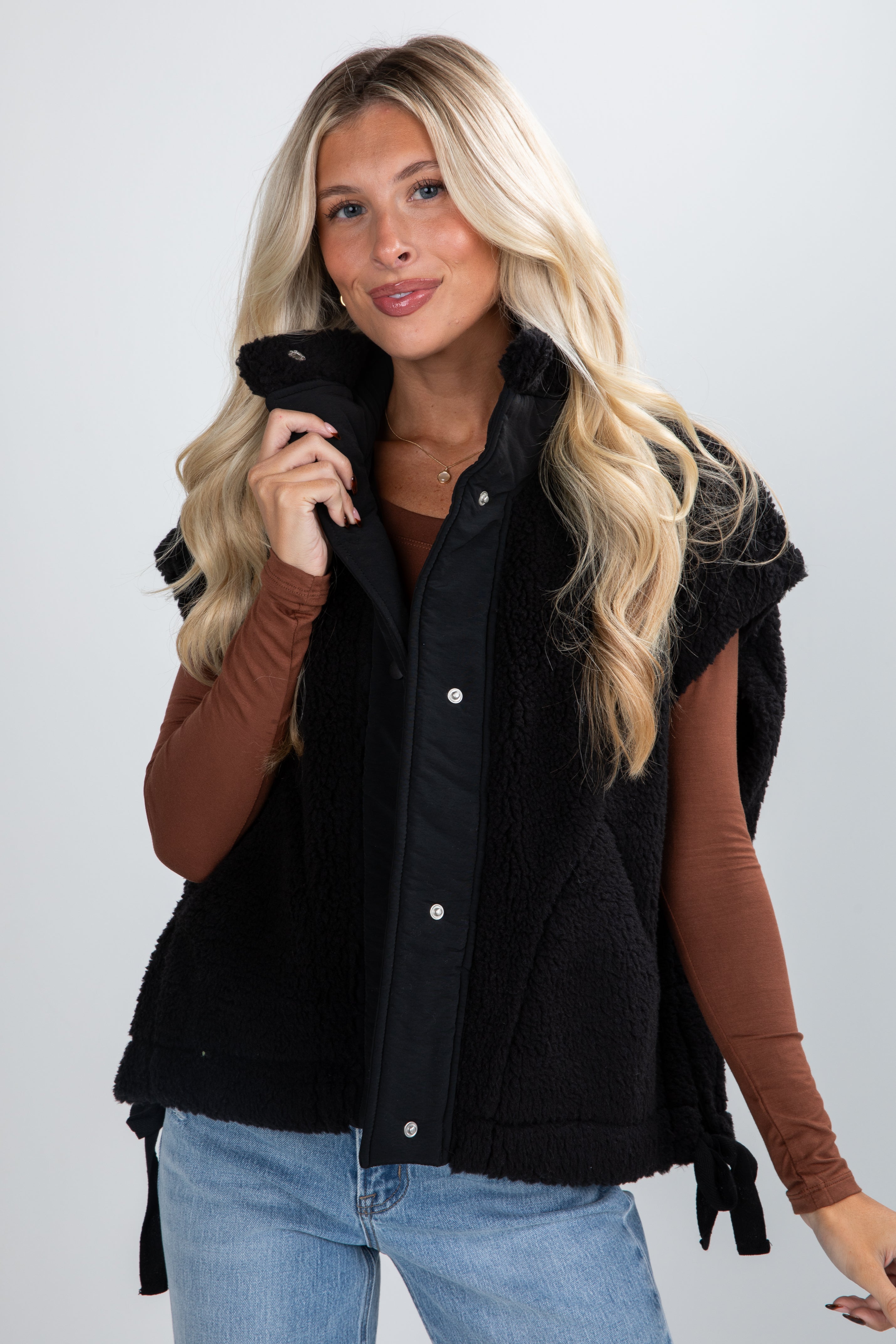 black sherpa vest