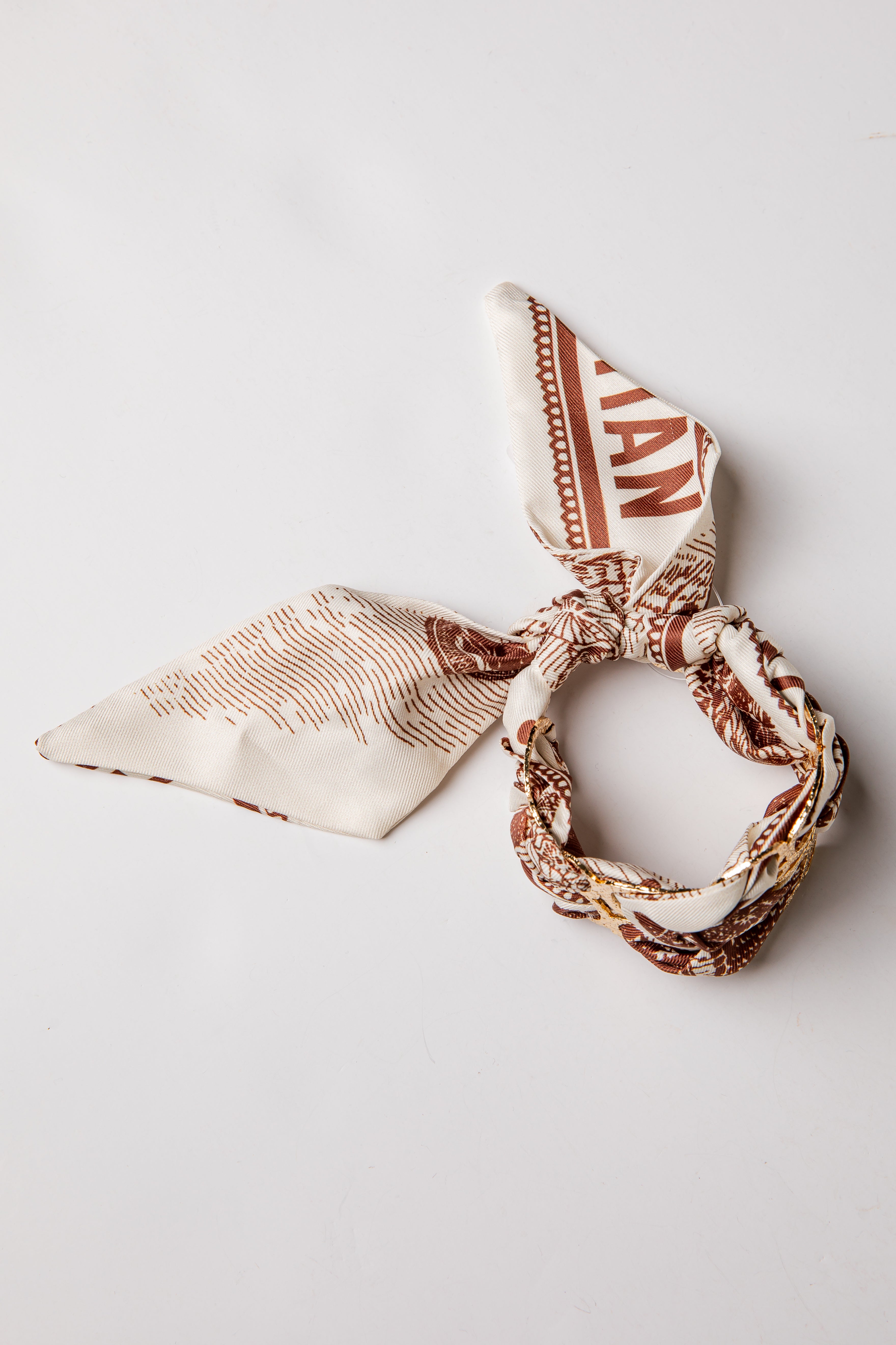 Patterned bracelet on a light gray background