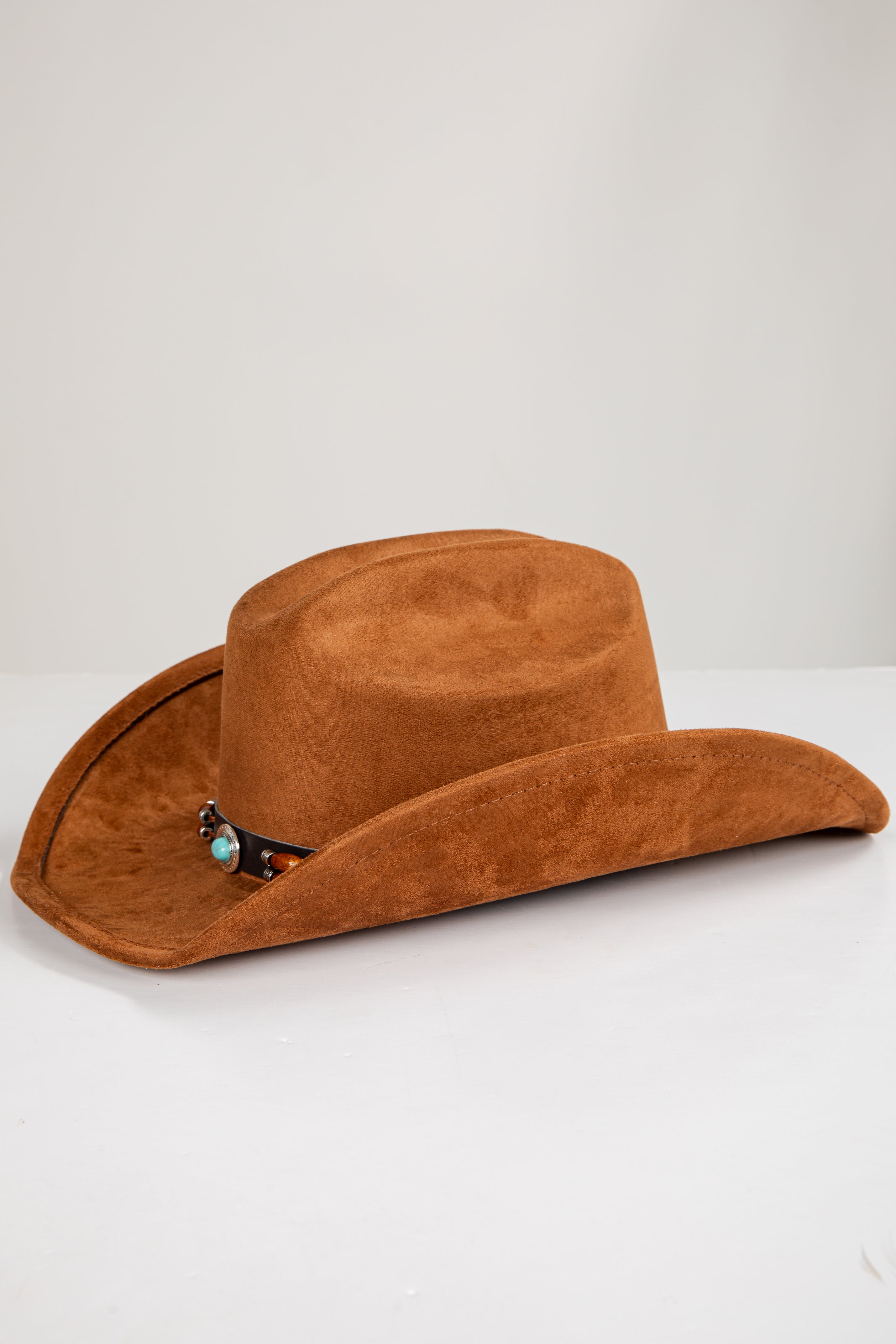 Brown cowboy hat on a white background