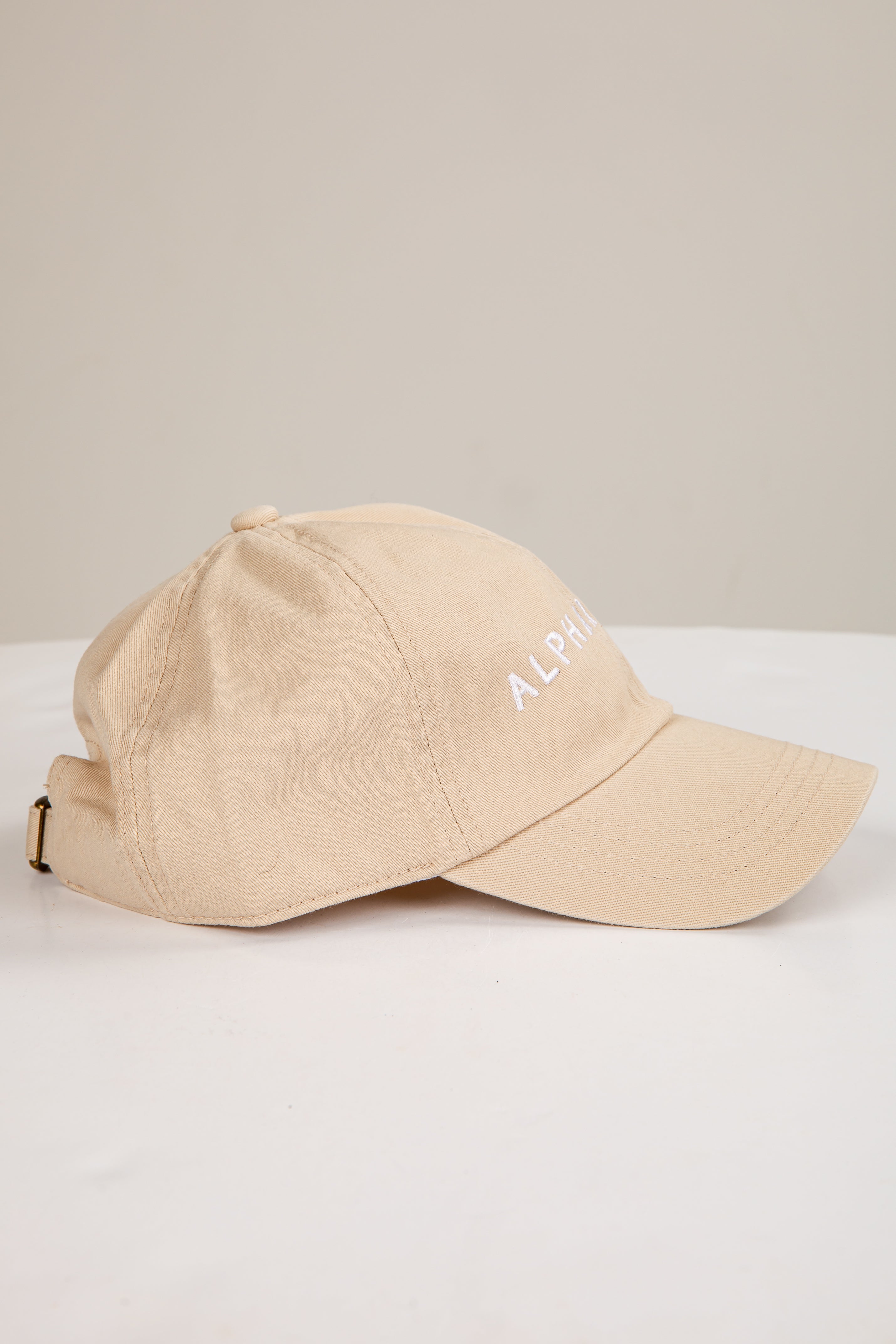 Beige cap with &