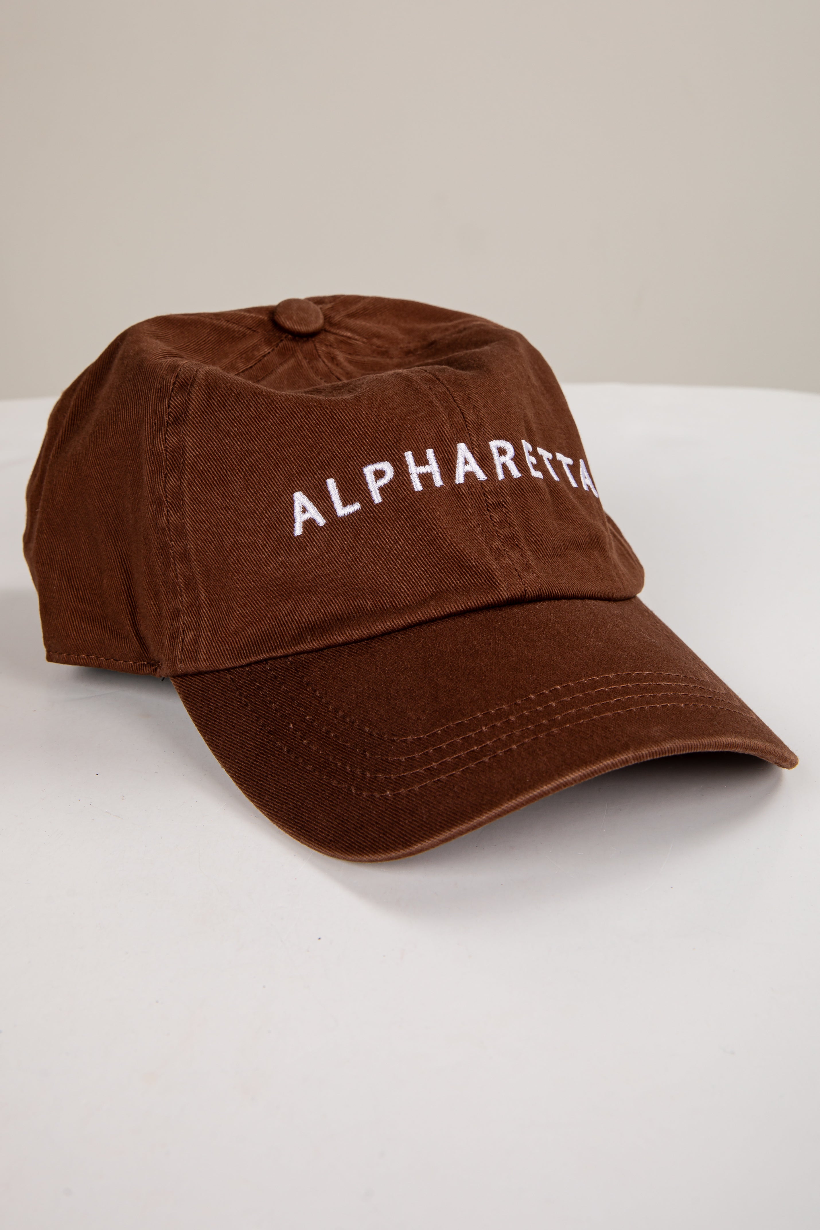Brown cap with &