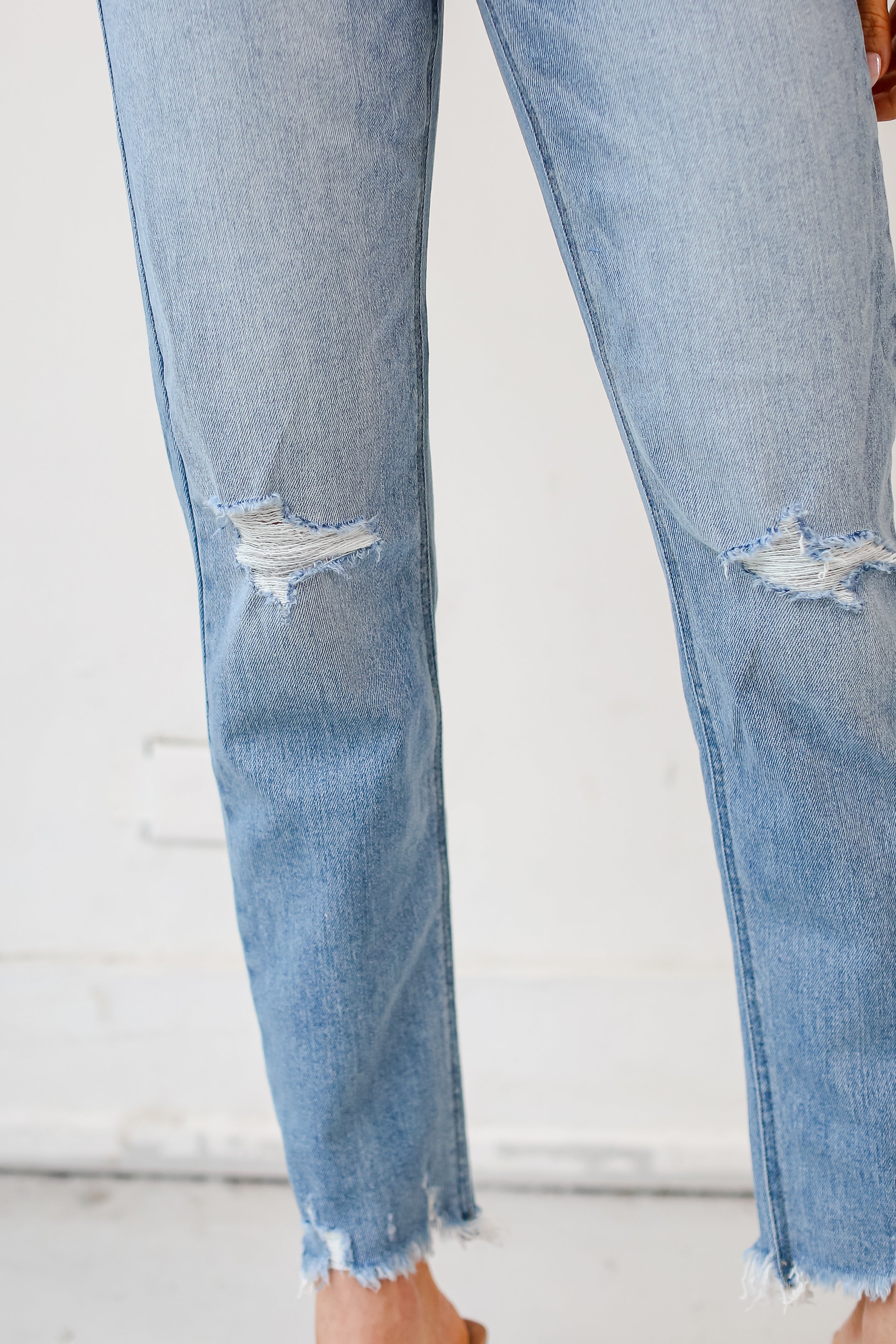 medium wash Distressed Mom Jeans close up