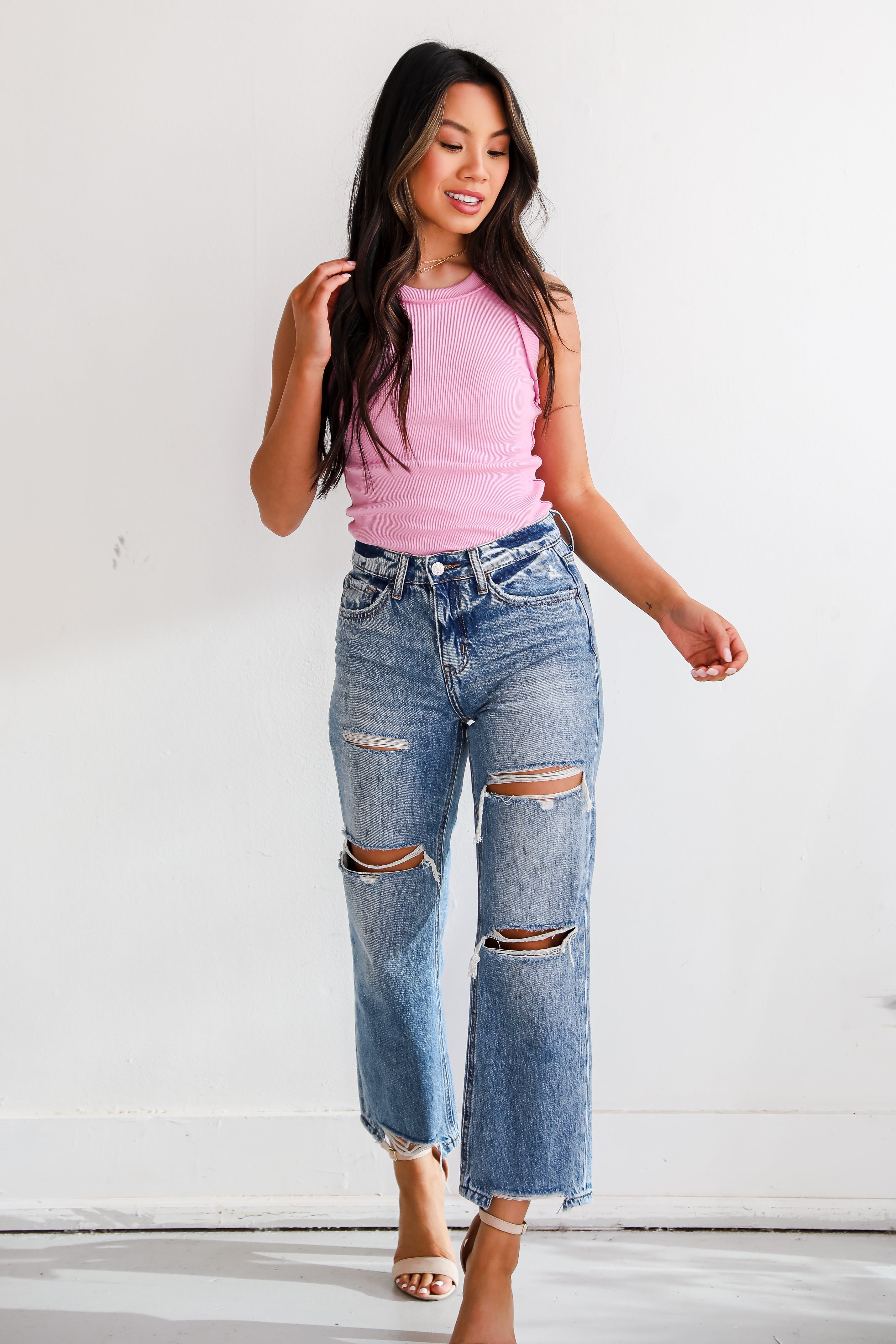 Medium Wash Distressed Straight Leg Jeans on model