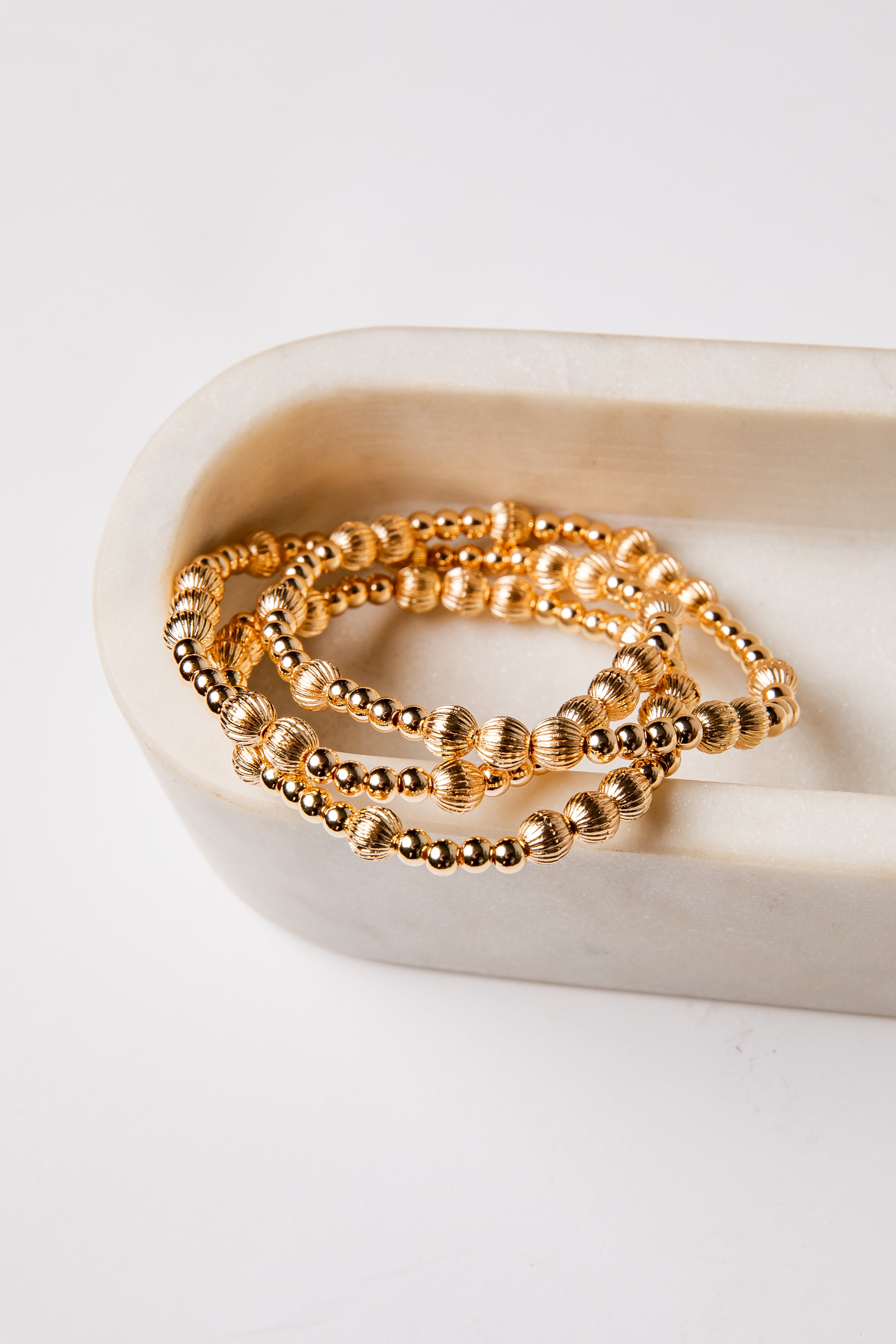 set of 3 gold beaded bracelets