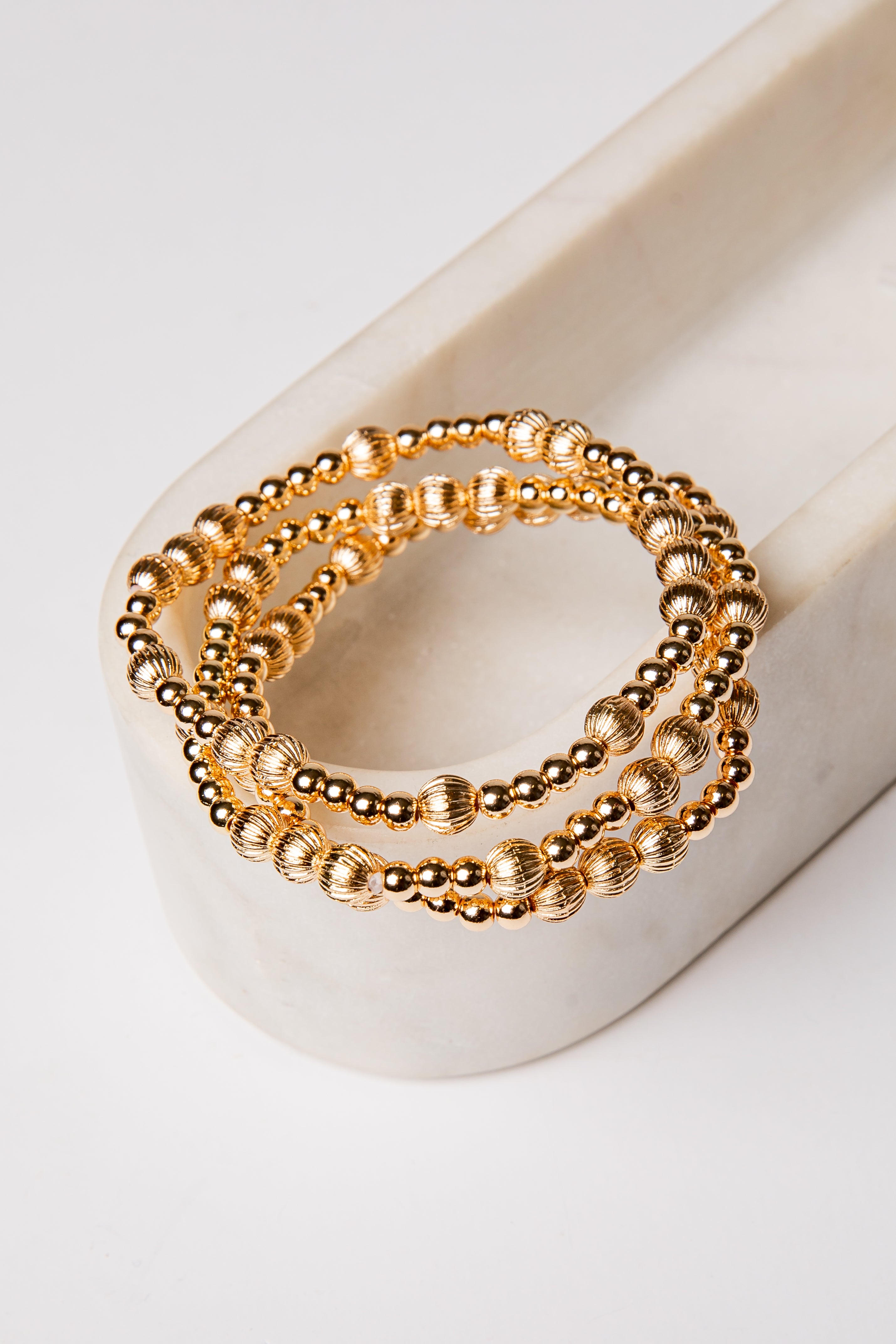 set of 3 gold beaded bracelets