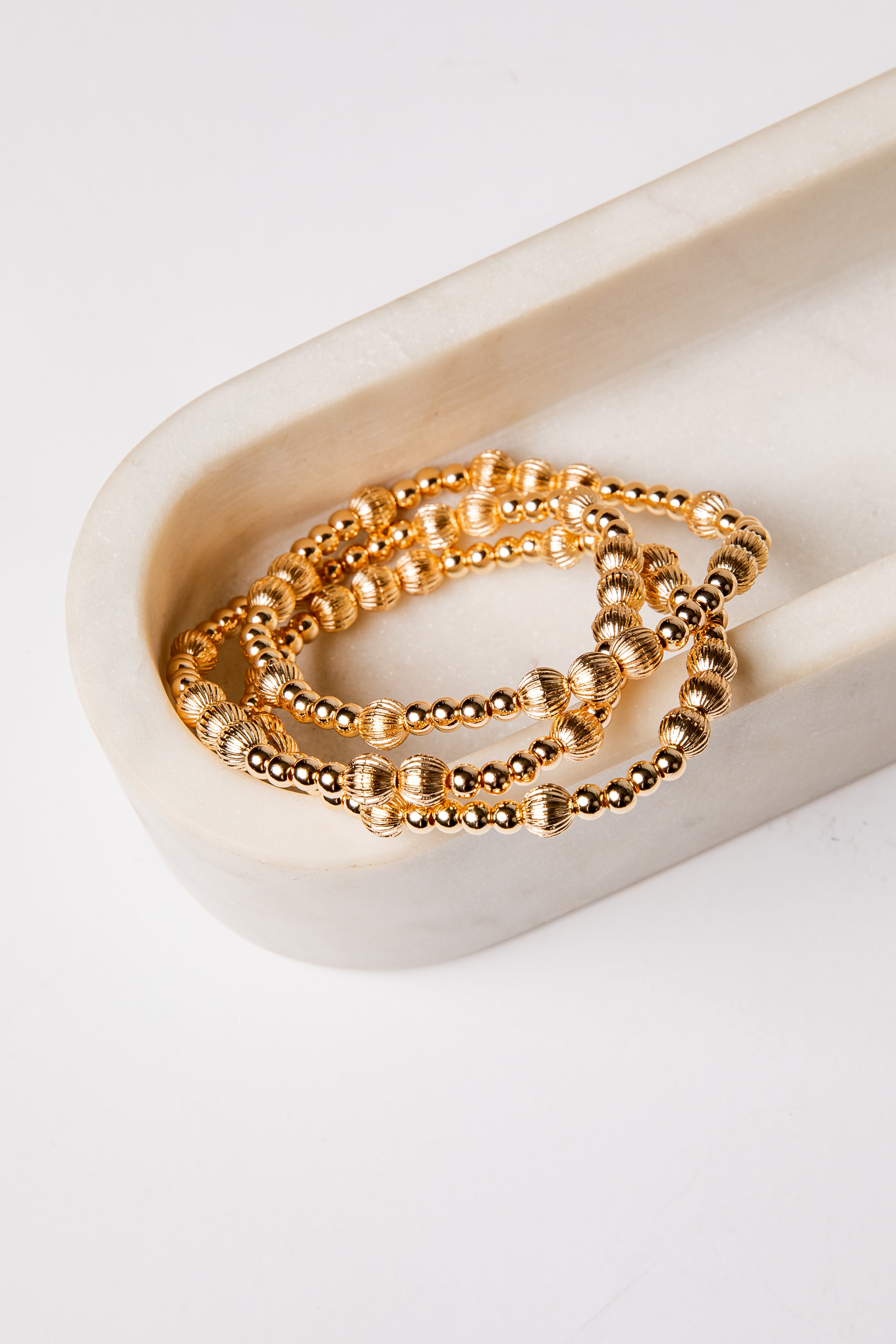 set of 3 gold beaded bracelets