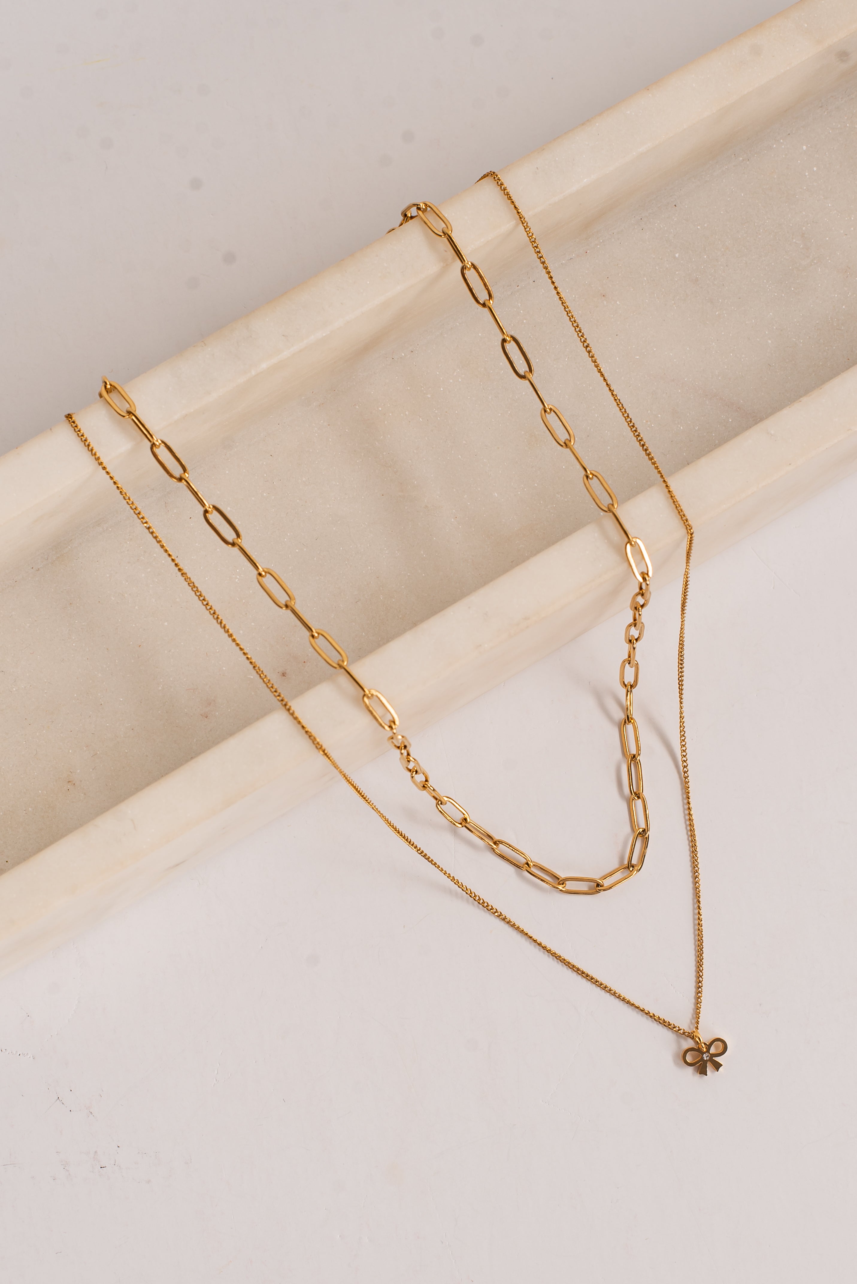 Jada Gold Layered Bow Charm Necklace