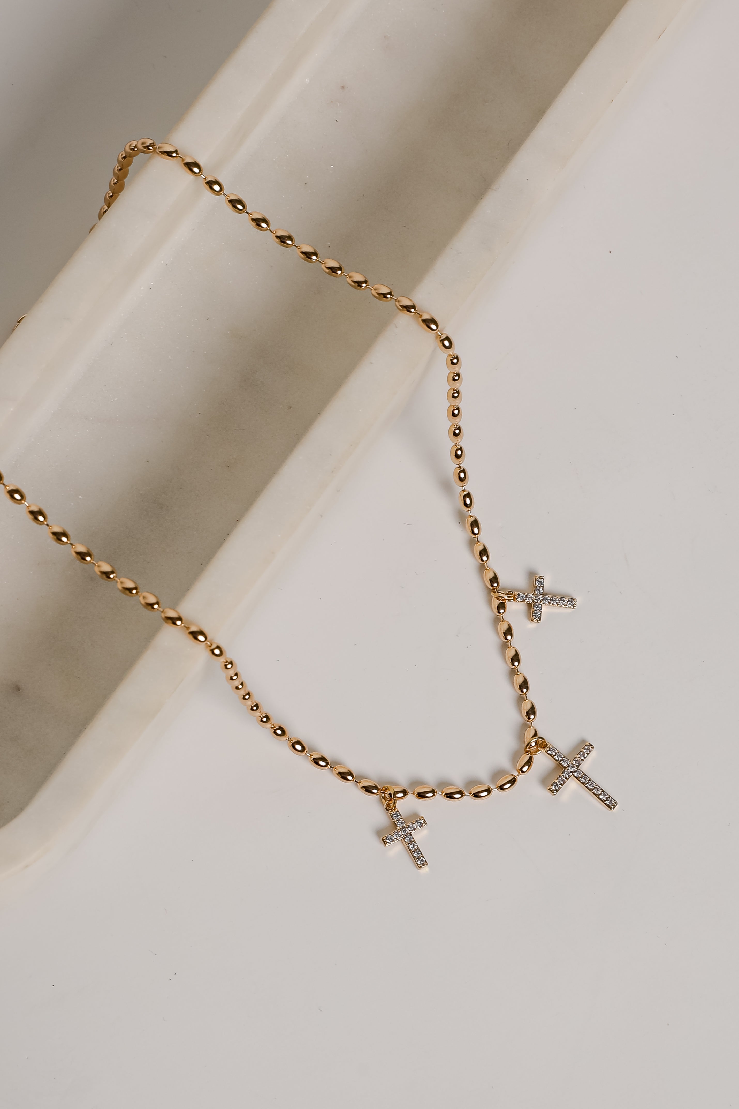 Naomi Gold Cross Charm Necklace