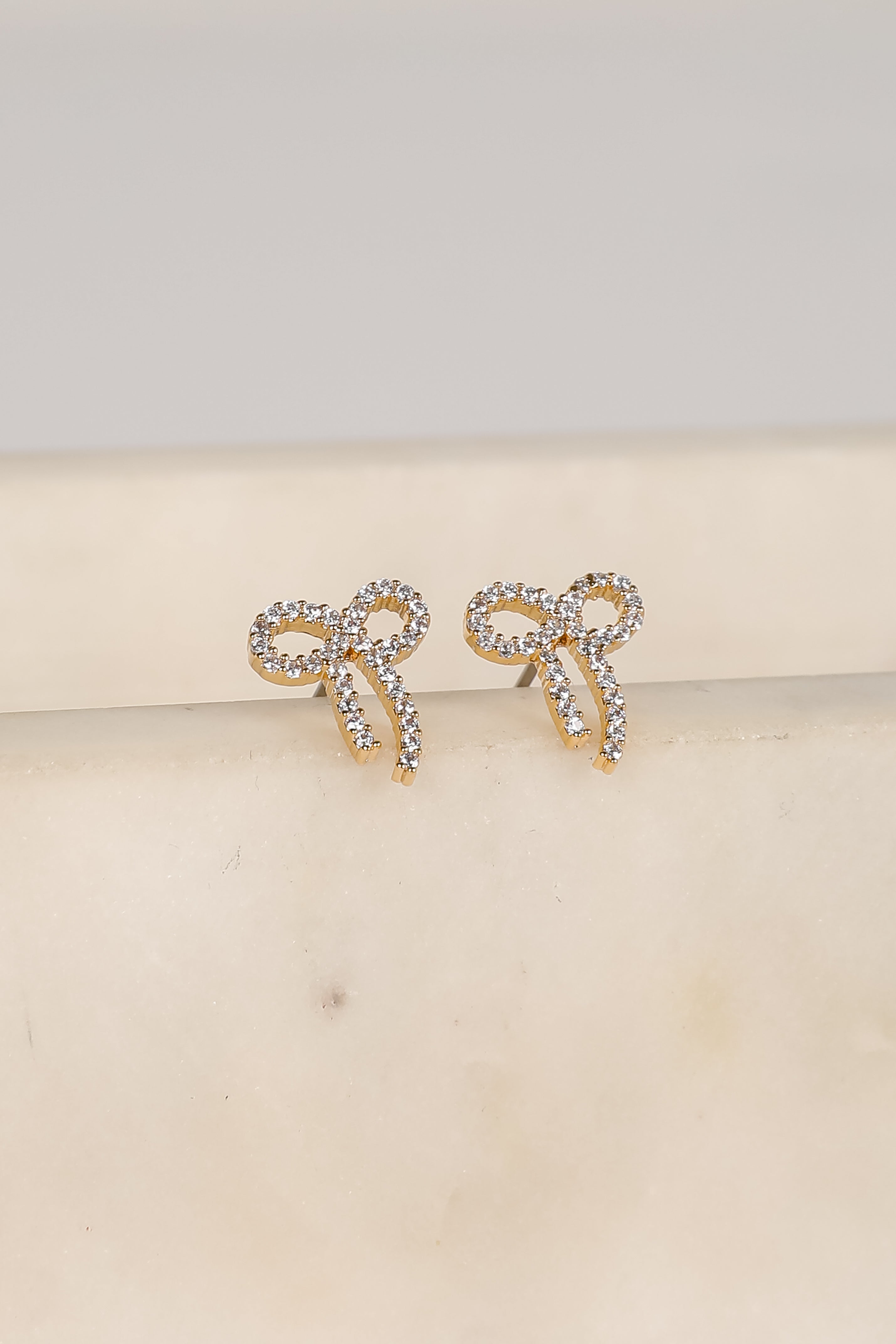 Daniella Gold Rhinestone Bow Earrings