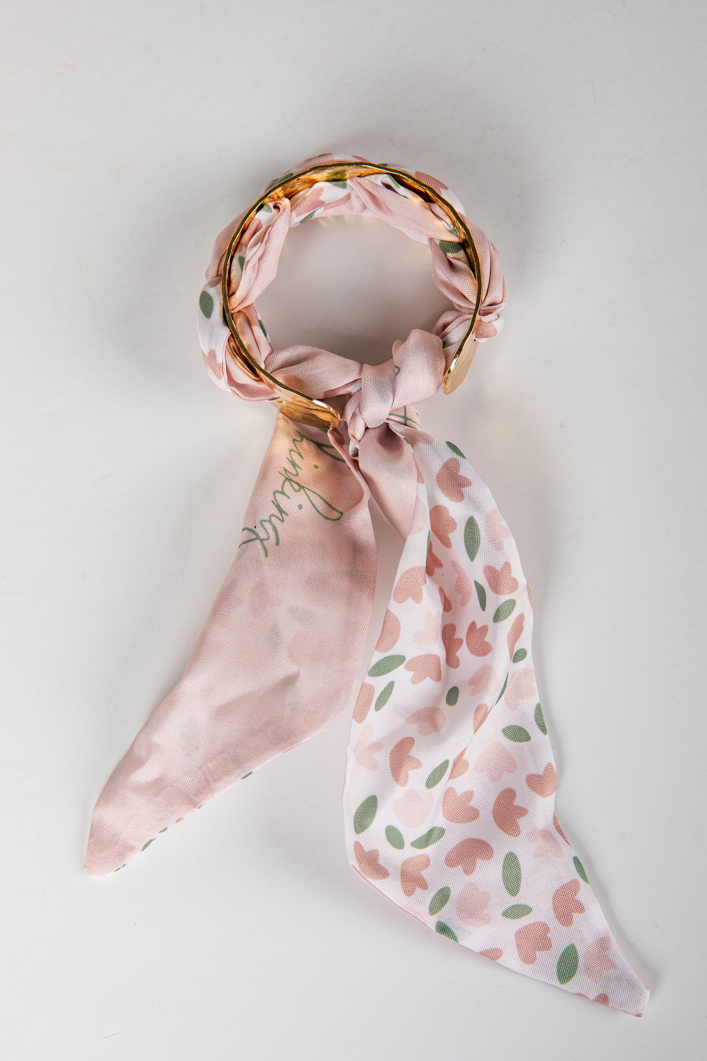 Floral patterned bracelet on a light gray background