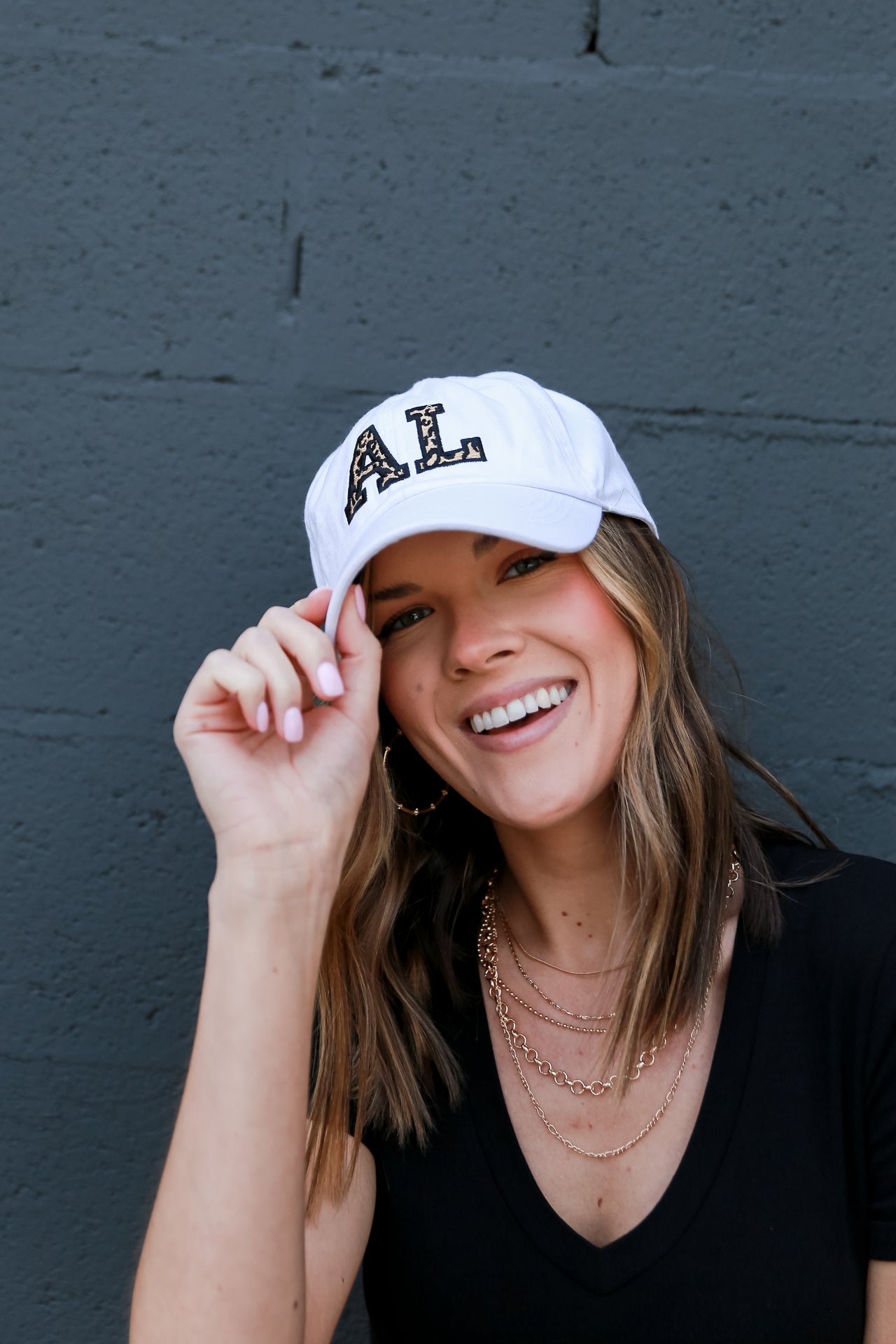 Model Wearing Alabama Leopard Hat