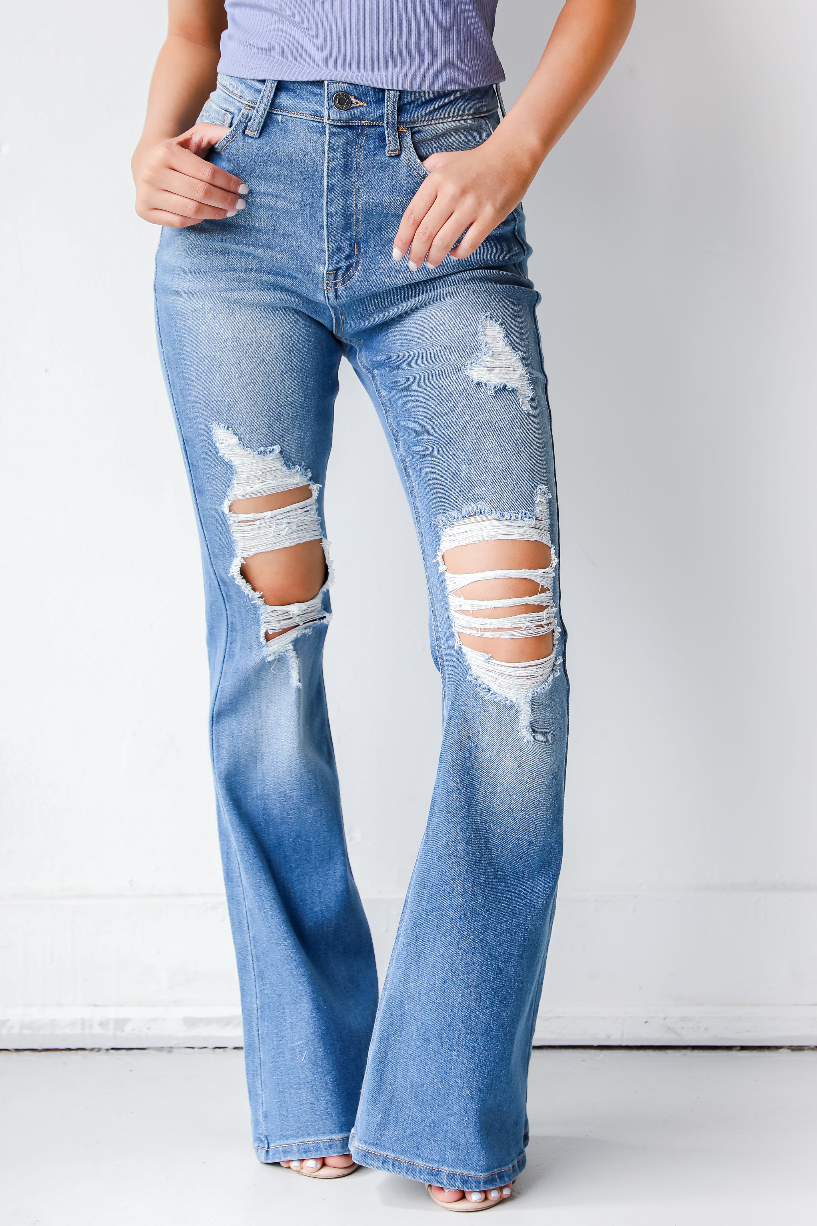 Distressed Flare Jeans on model