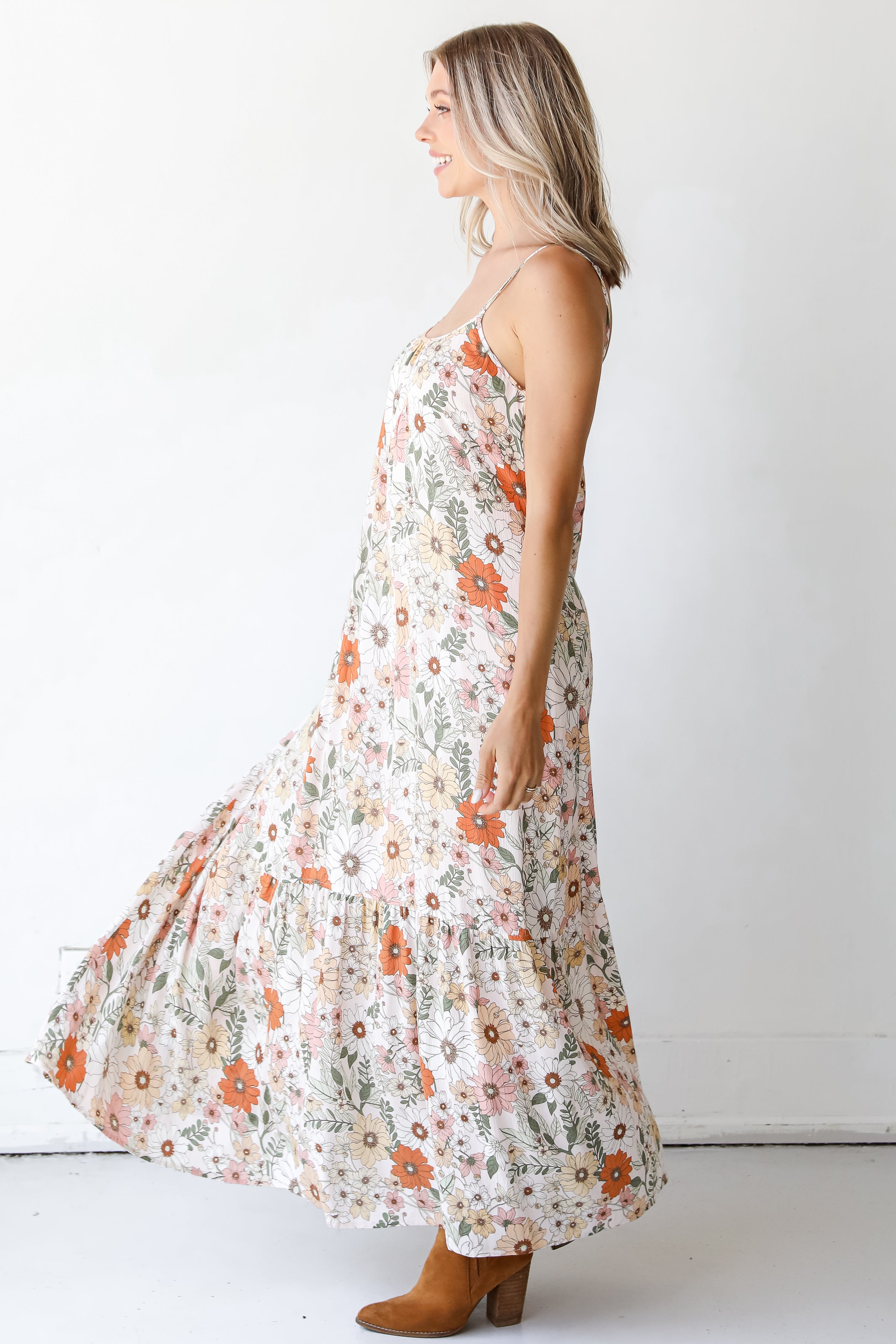 side view of an ivory Floral Maxi Dress