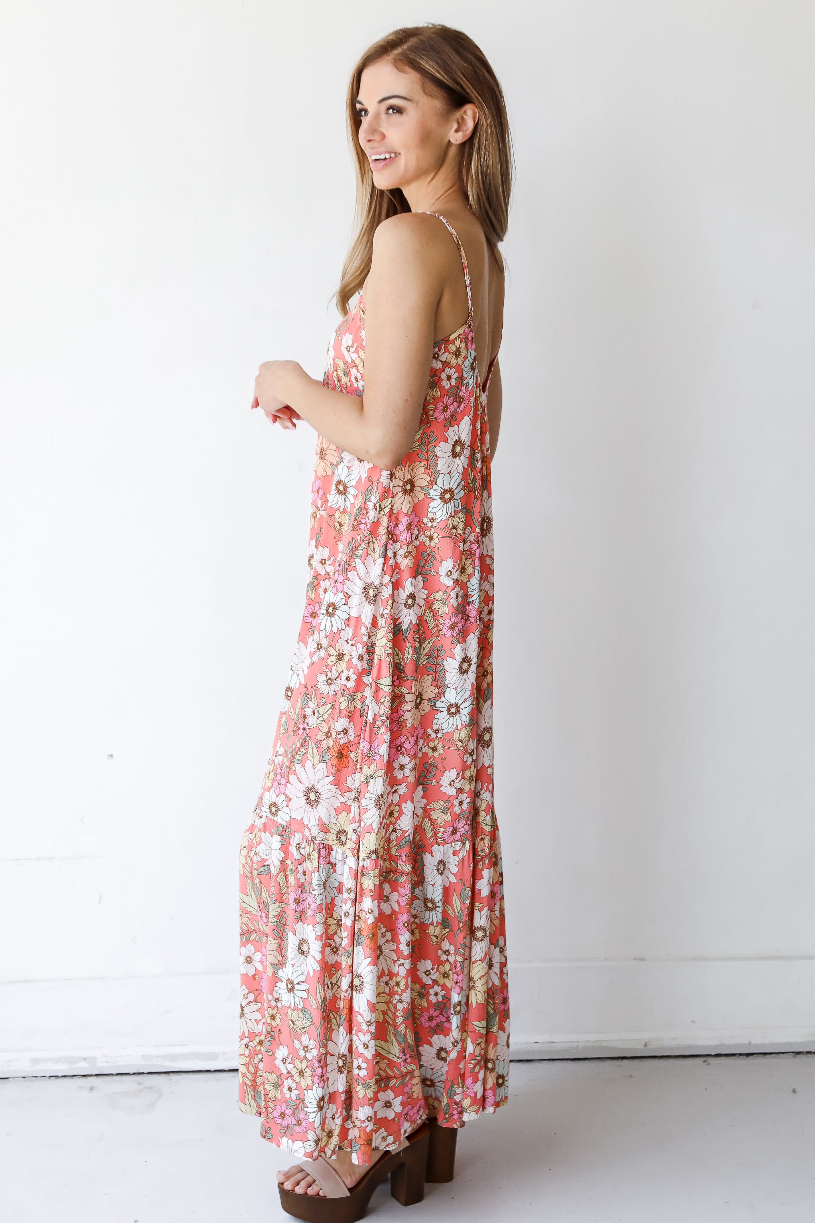 side view of a coral Floral Maxi Dress