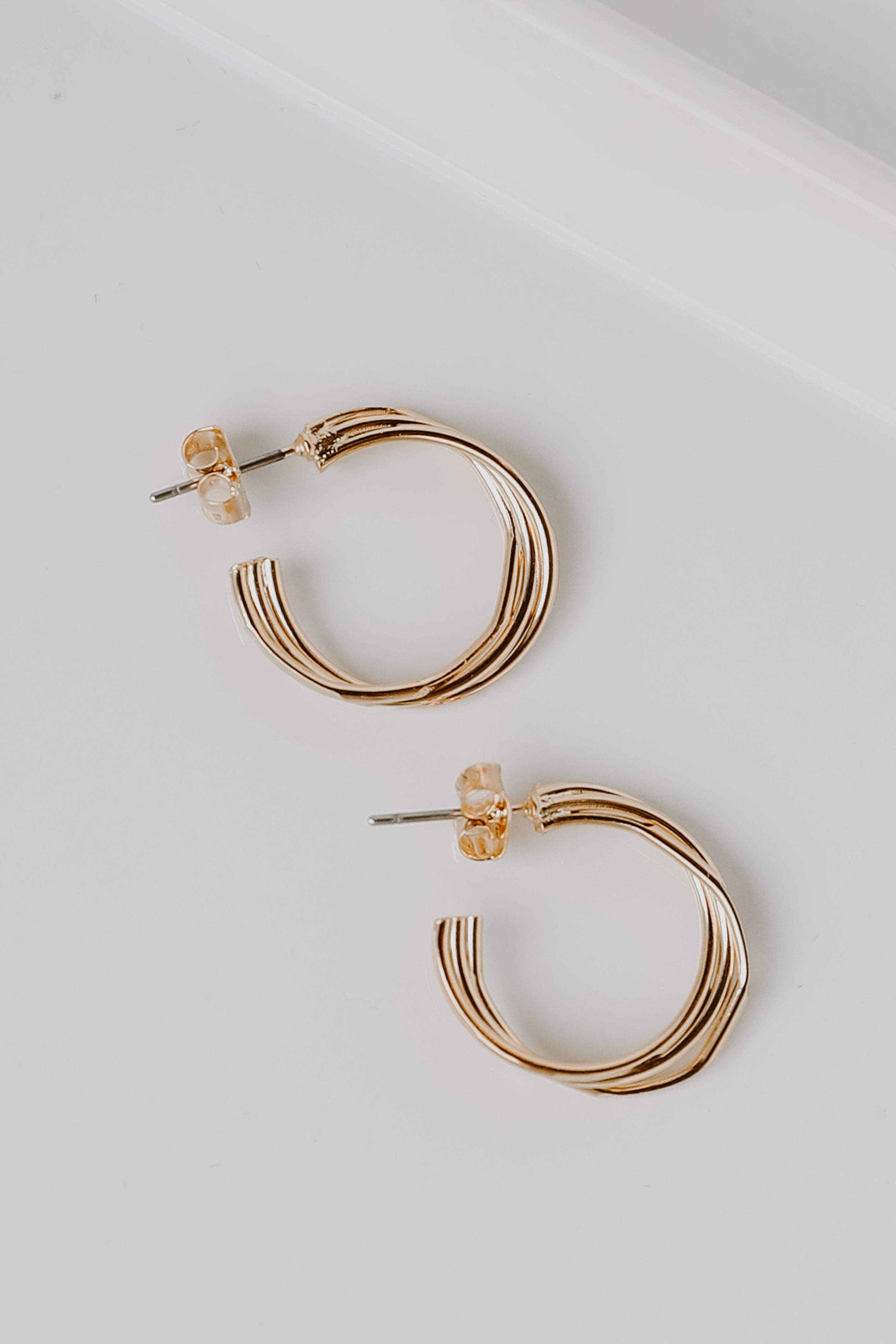 Gold Twisted Hoop Earrings from dress up