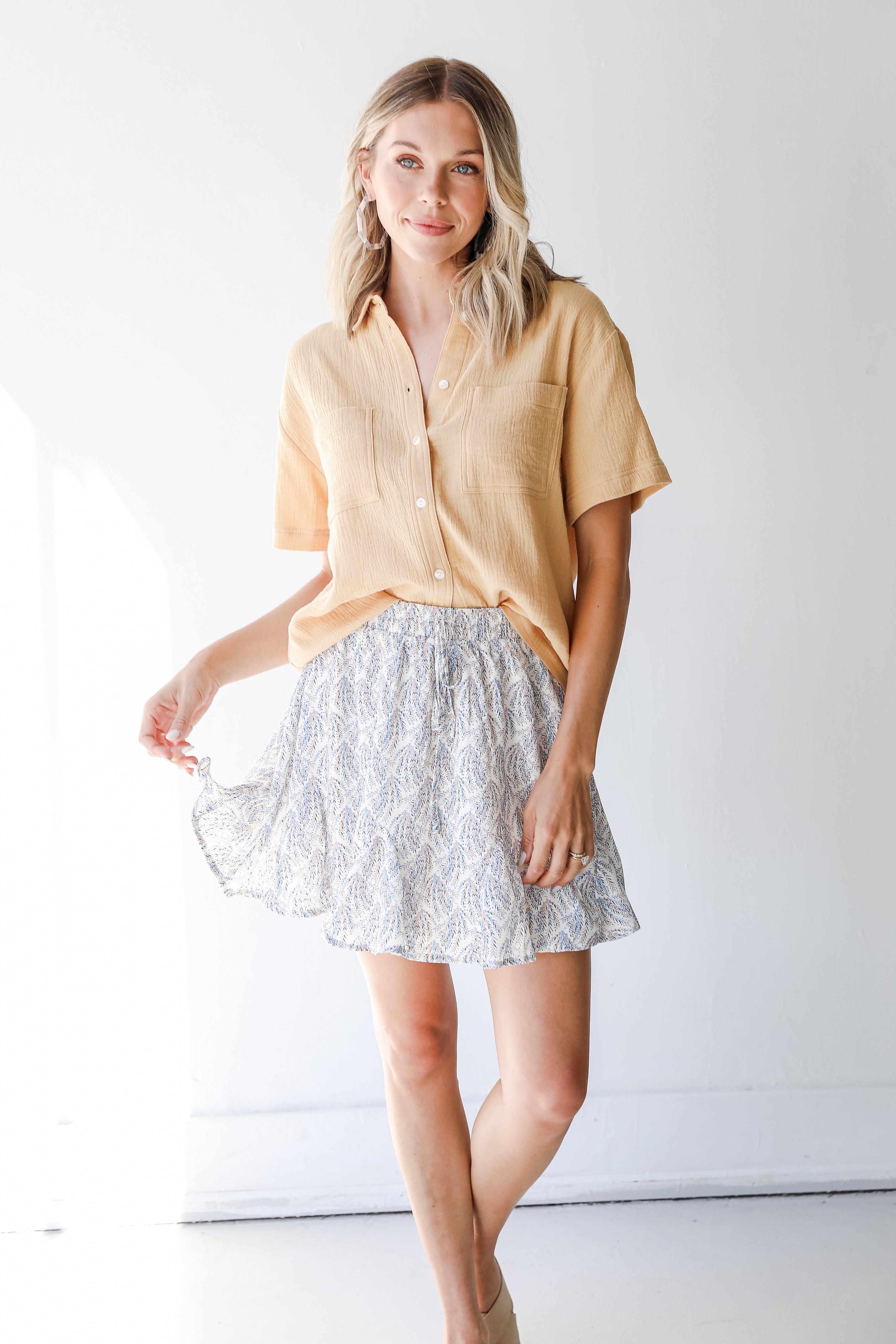 Mini Skirt in ivory on model