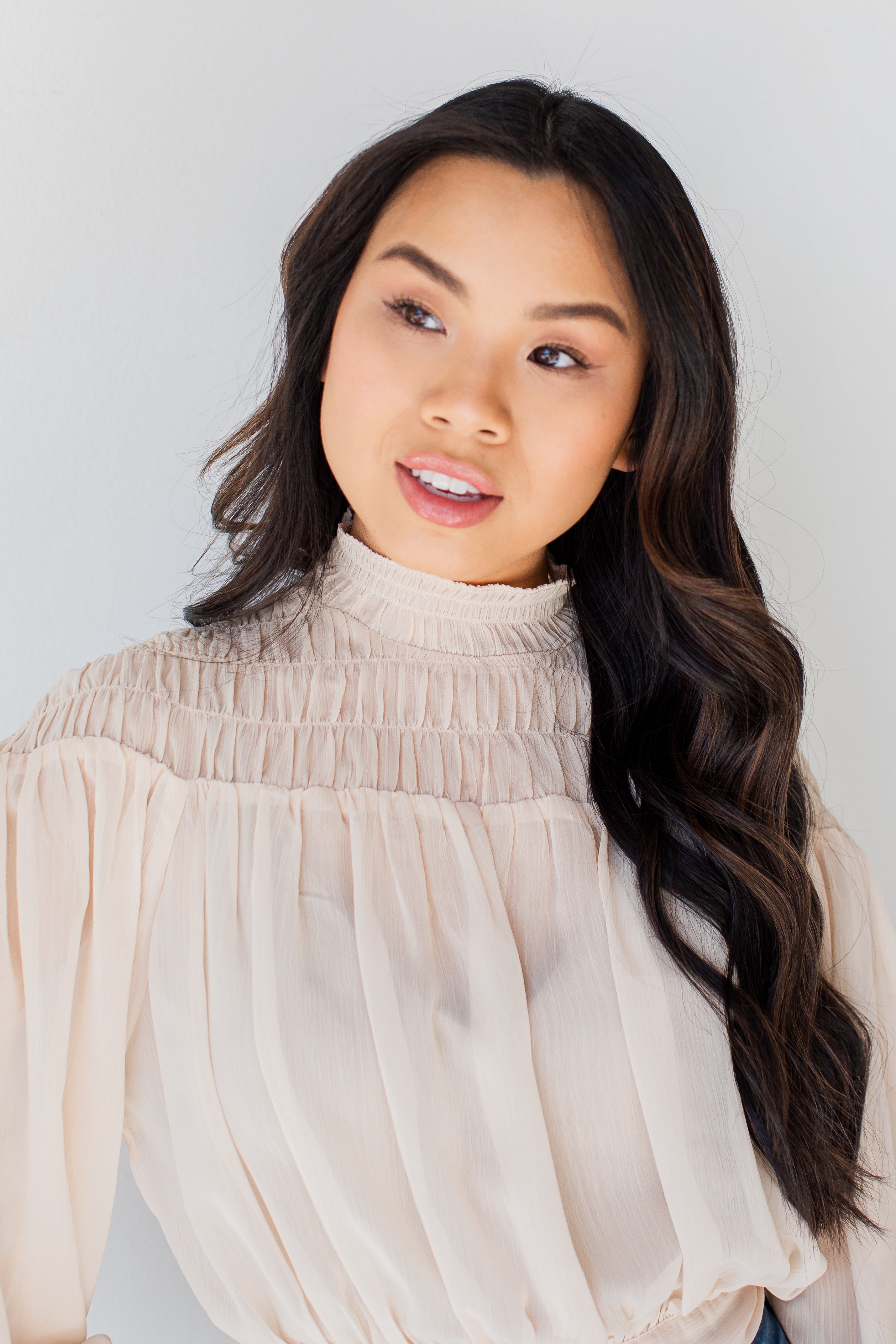 Smocked Blouse in ivory close up