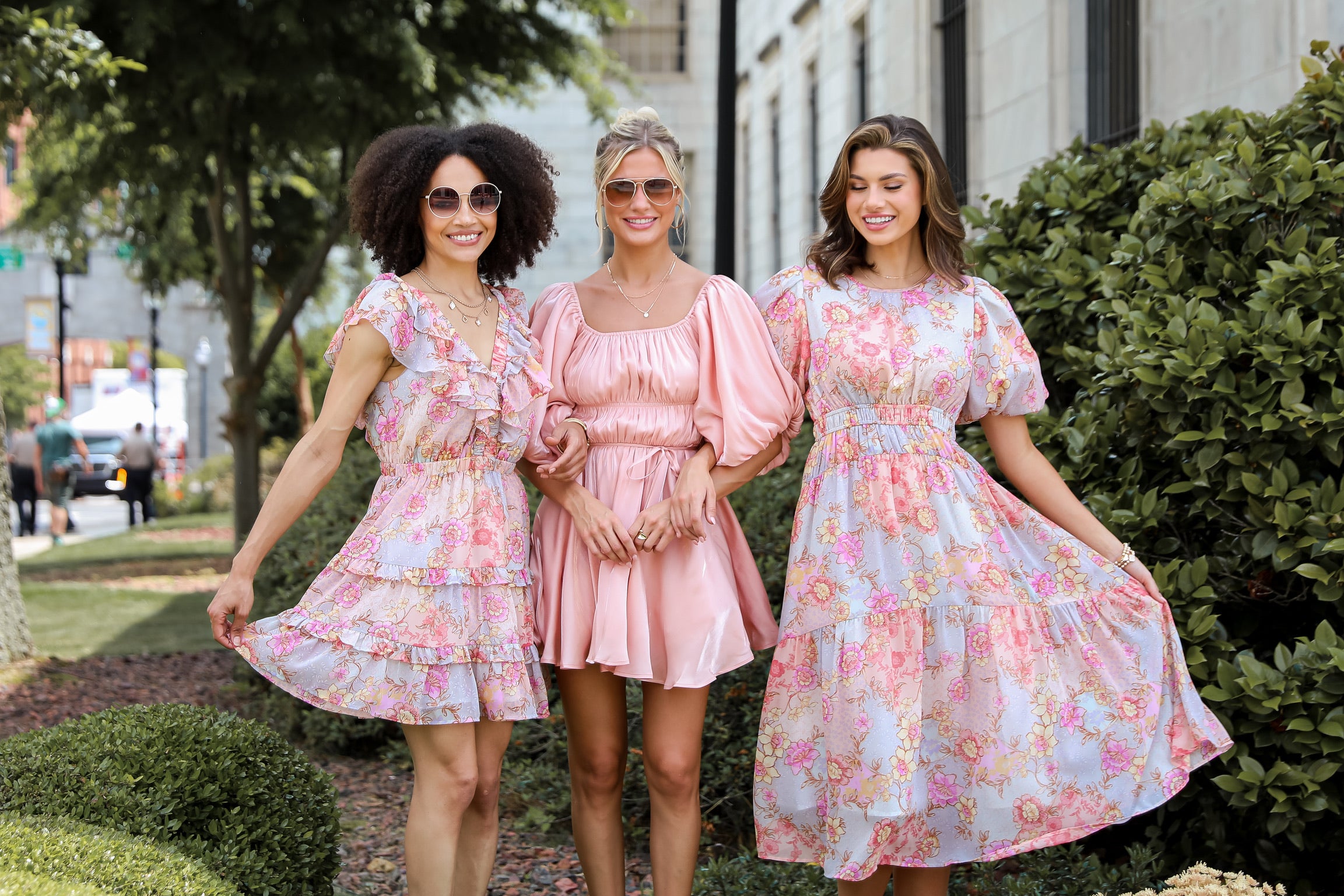 models wearing floral dresses