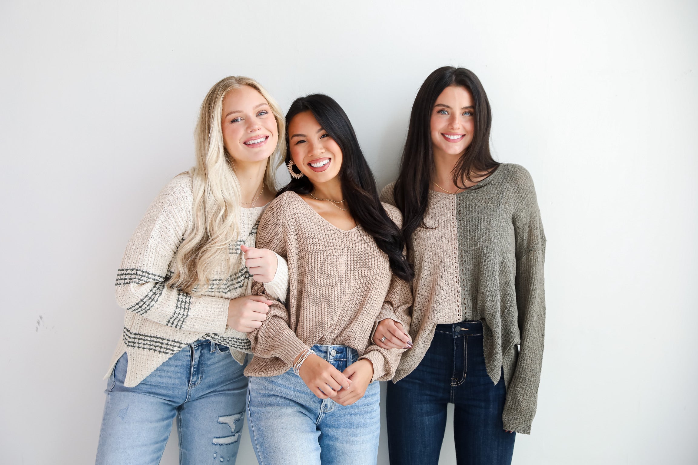 models wearing lightweight sweaters