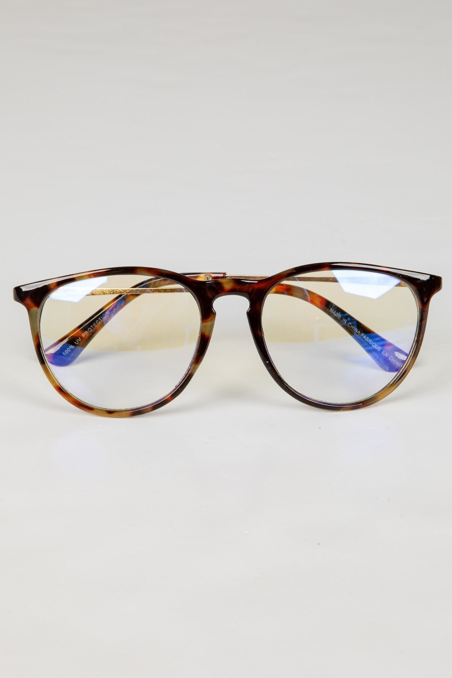 Tortoiseshell glasses on a white background