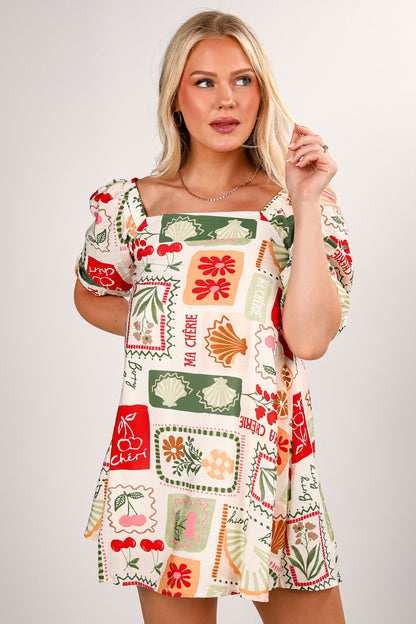 Woman wearing a colorful patterned dress on a plain background