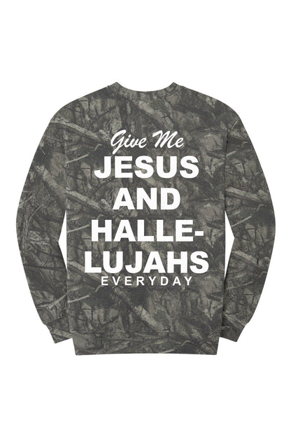 A long-sleeve crewneck sweatshirt featuring a dark gray and black woodland camouflage pattern with bold white text on the front that reads &
