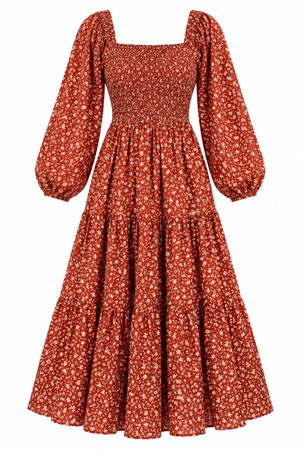 A long-sleeved midi dress with a smocked bodice and tiered skirt, featuring a rust red and white floral pattern, shown against a plain white background.