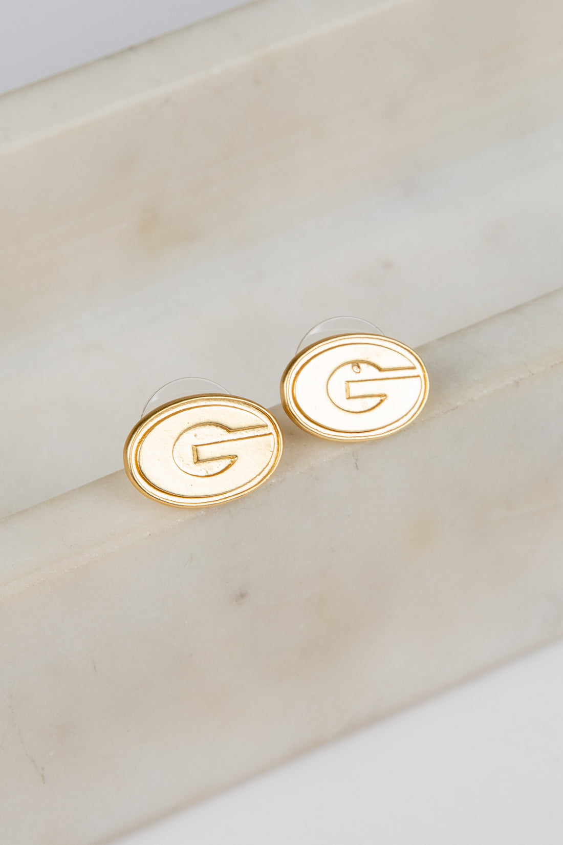 Gold earrings with &