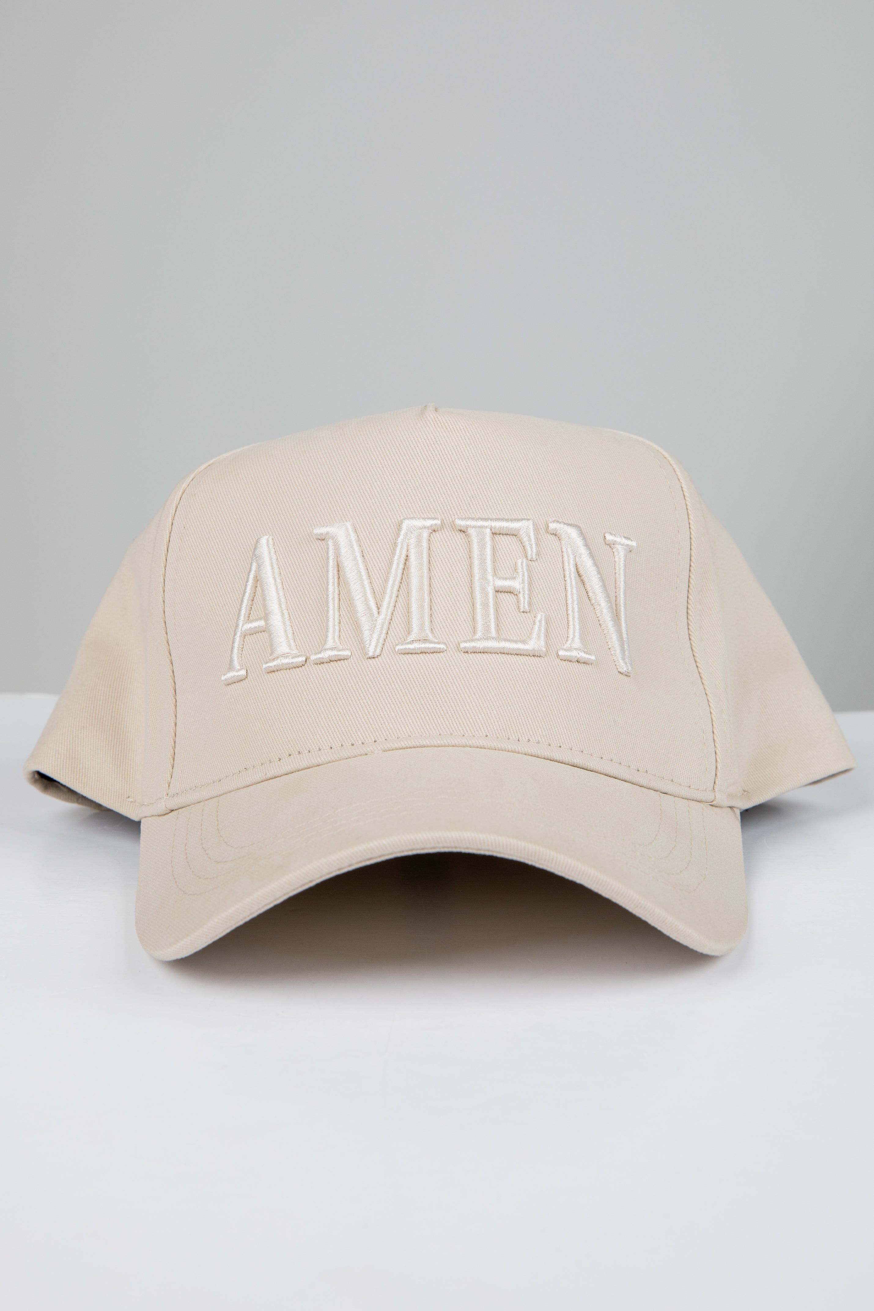 Beige cap with &