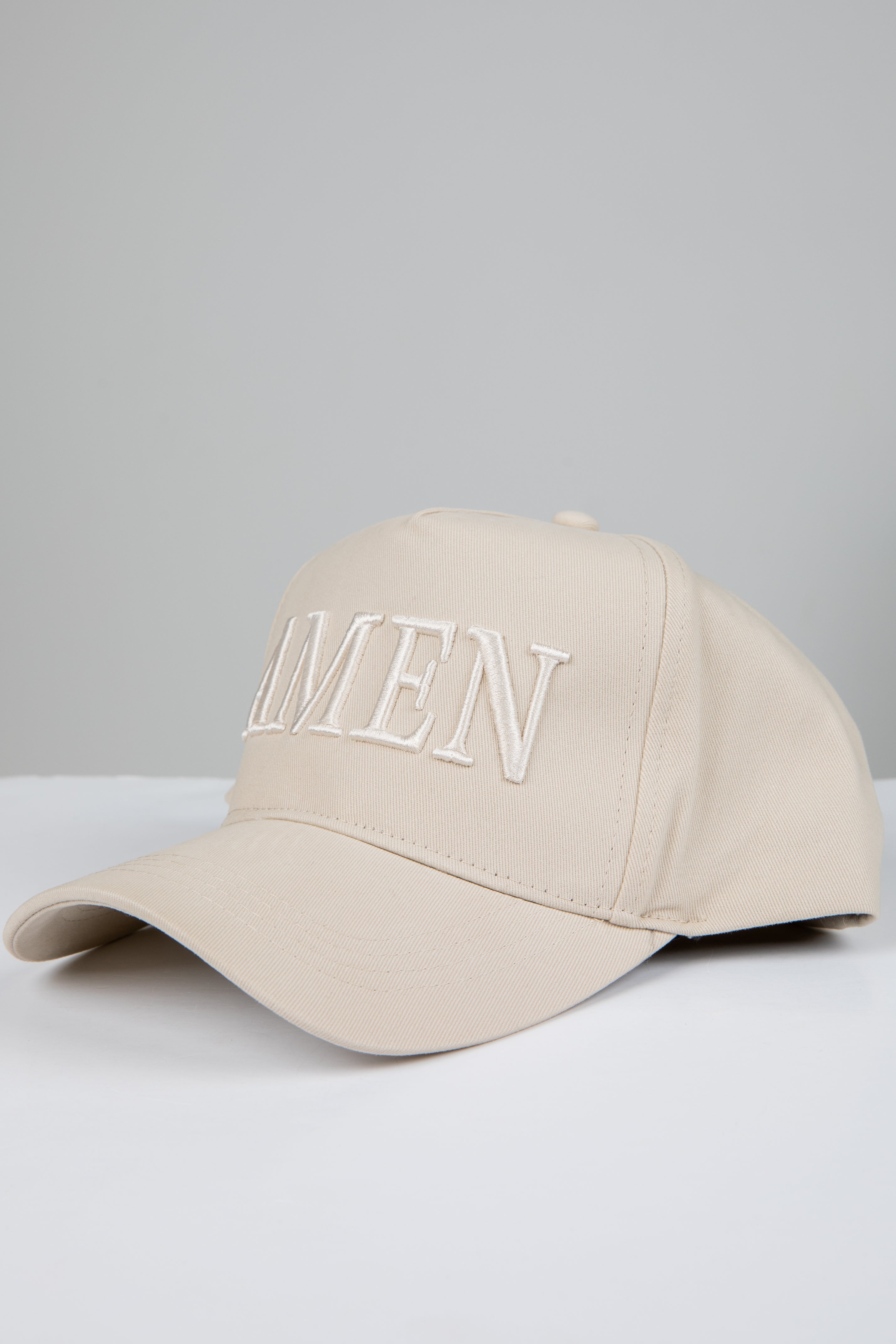 Beige cap with &