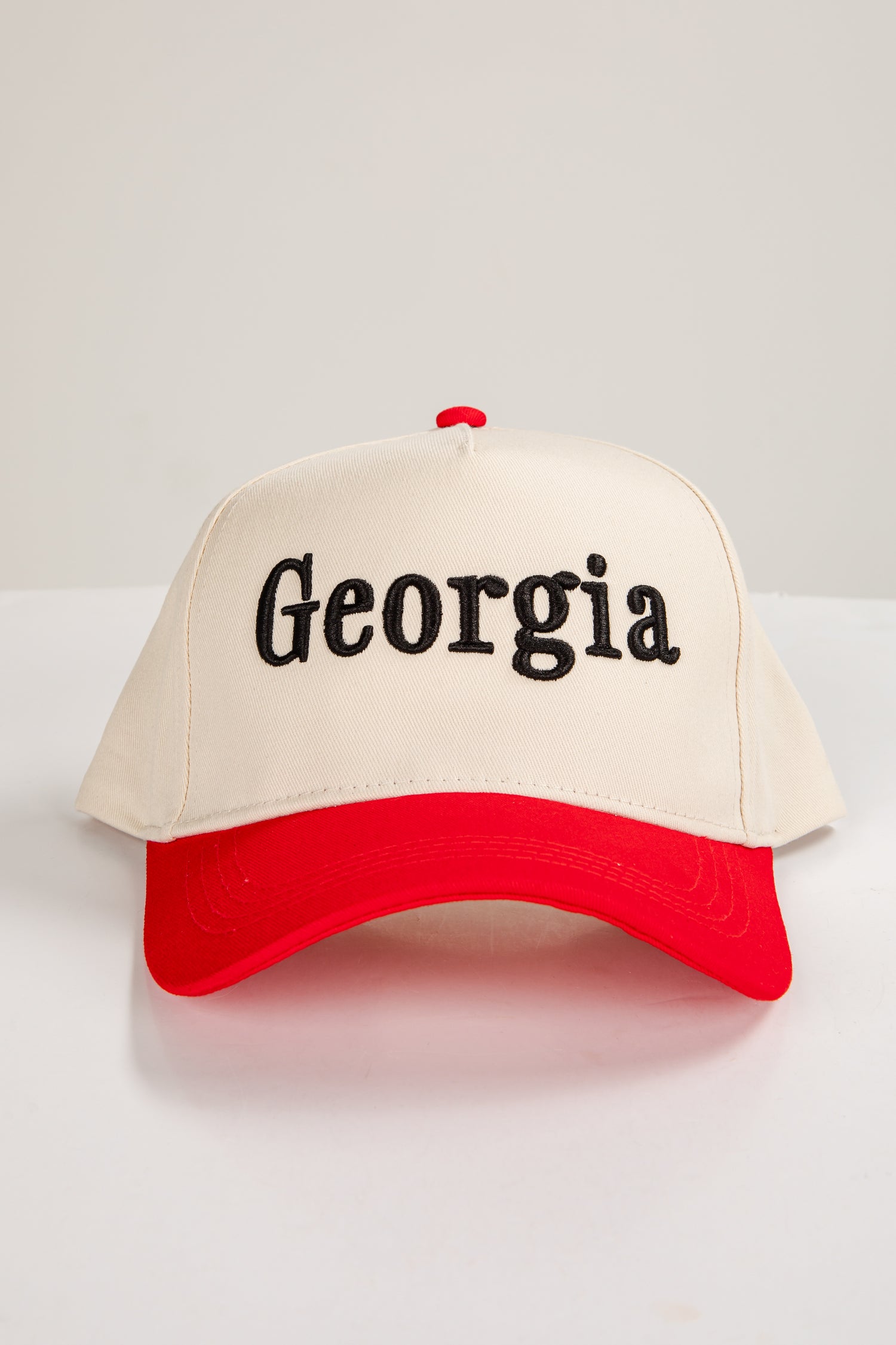Cap with &