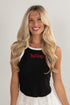 Woman wearing a black tank top with &