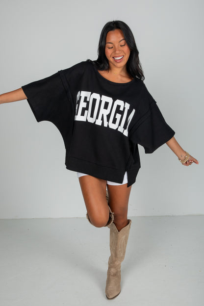 Woman wearing a black &