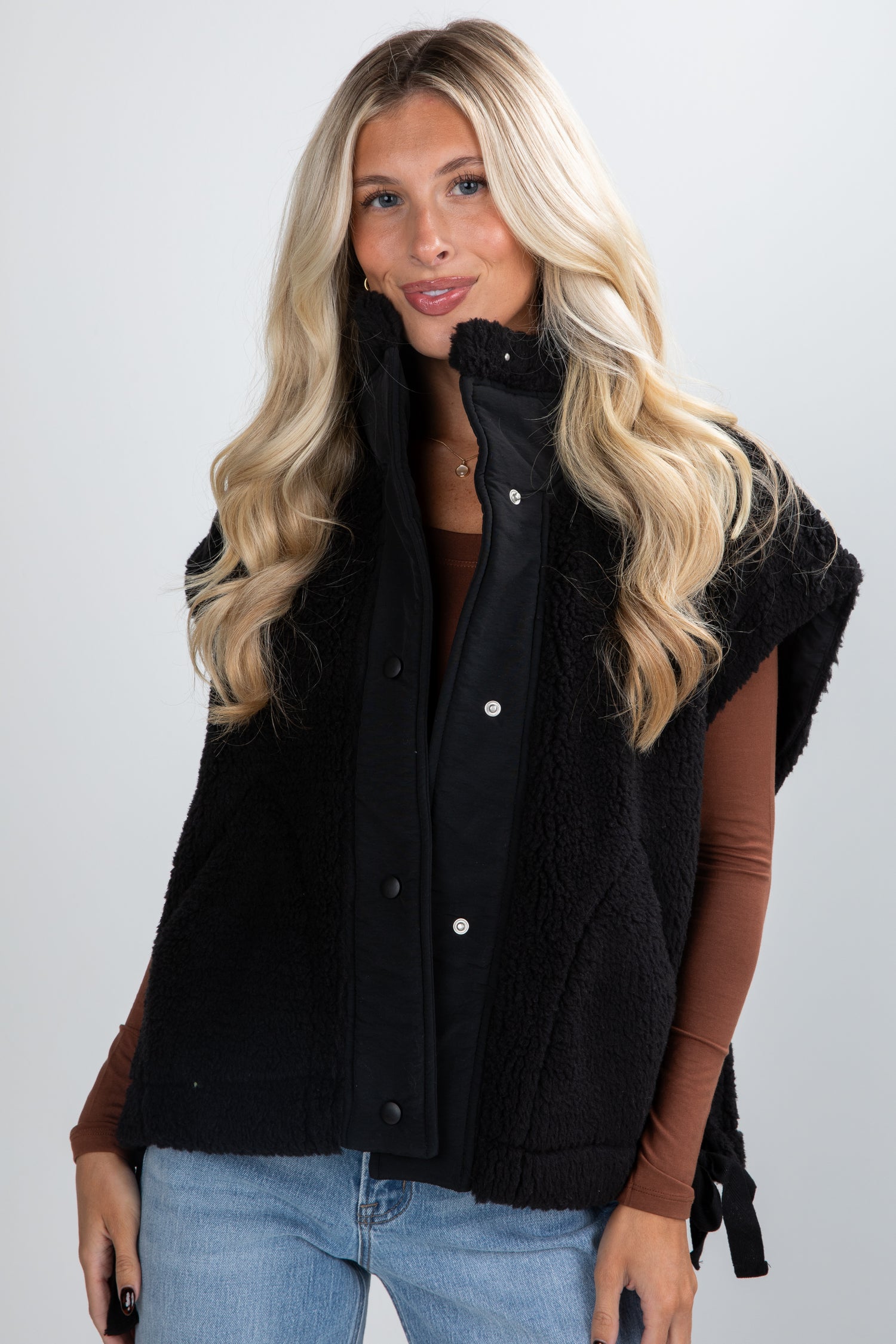black sherpa vest