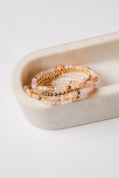 set of 4 gold and colorful beaded bracelets
