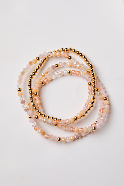 set of 4 gold and colorful beaded bracelets