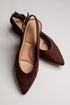 A pair of dark brown suede pointed-toe slingback pumps with a low block heel, displayed on a light gray background.