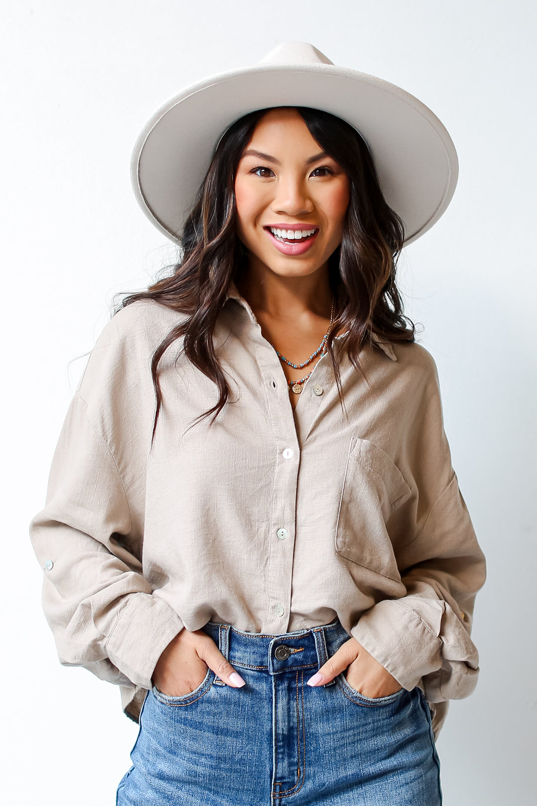 taupe Linen Button-Up Blouse on dress up model