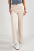 Beige pants worn by a person on a white background