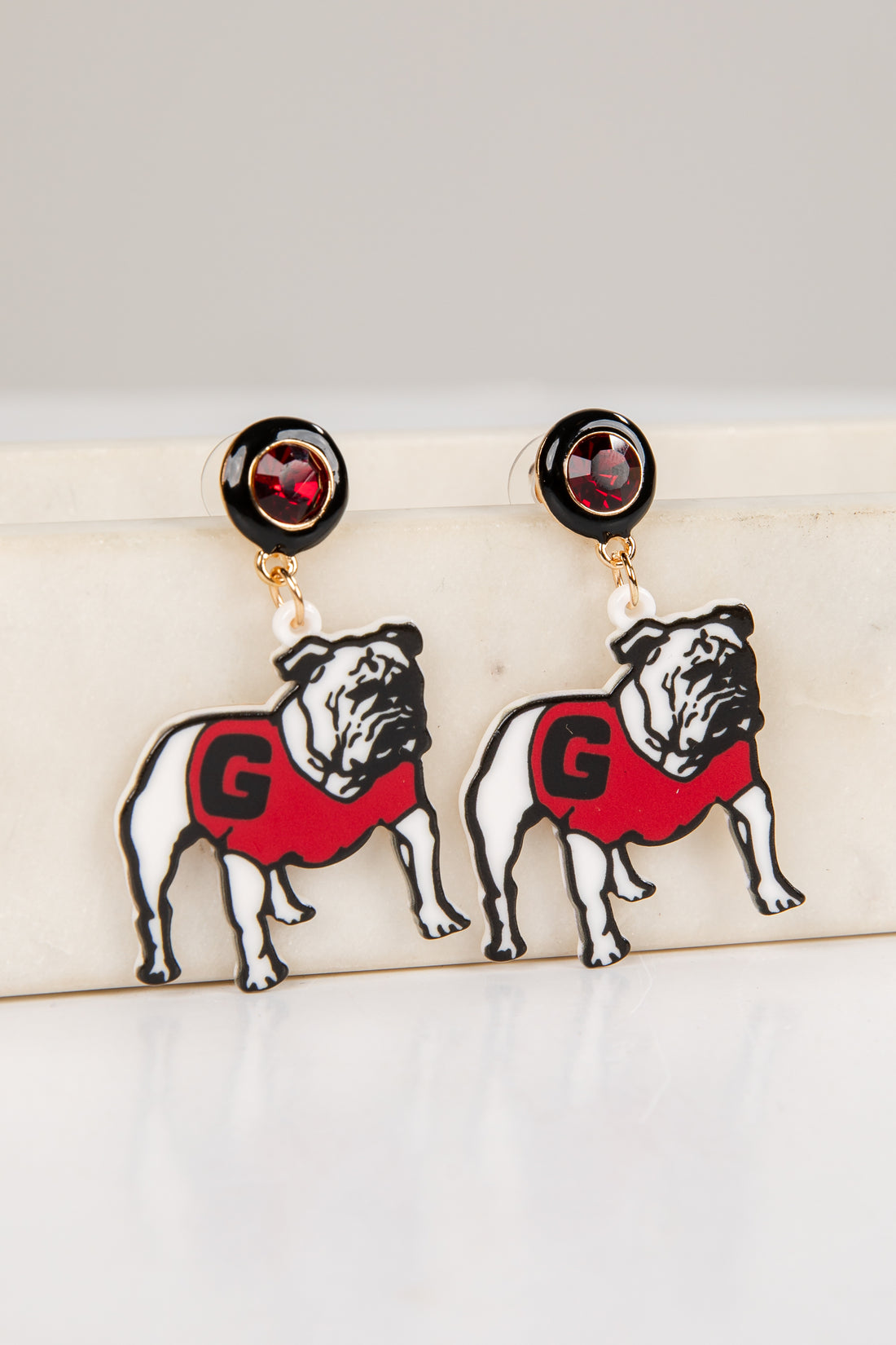 Pair of bulldog earrings with red &