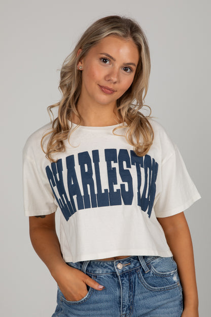 Woman wearing a white t-shirt with &