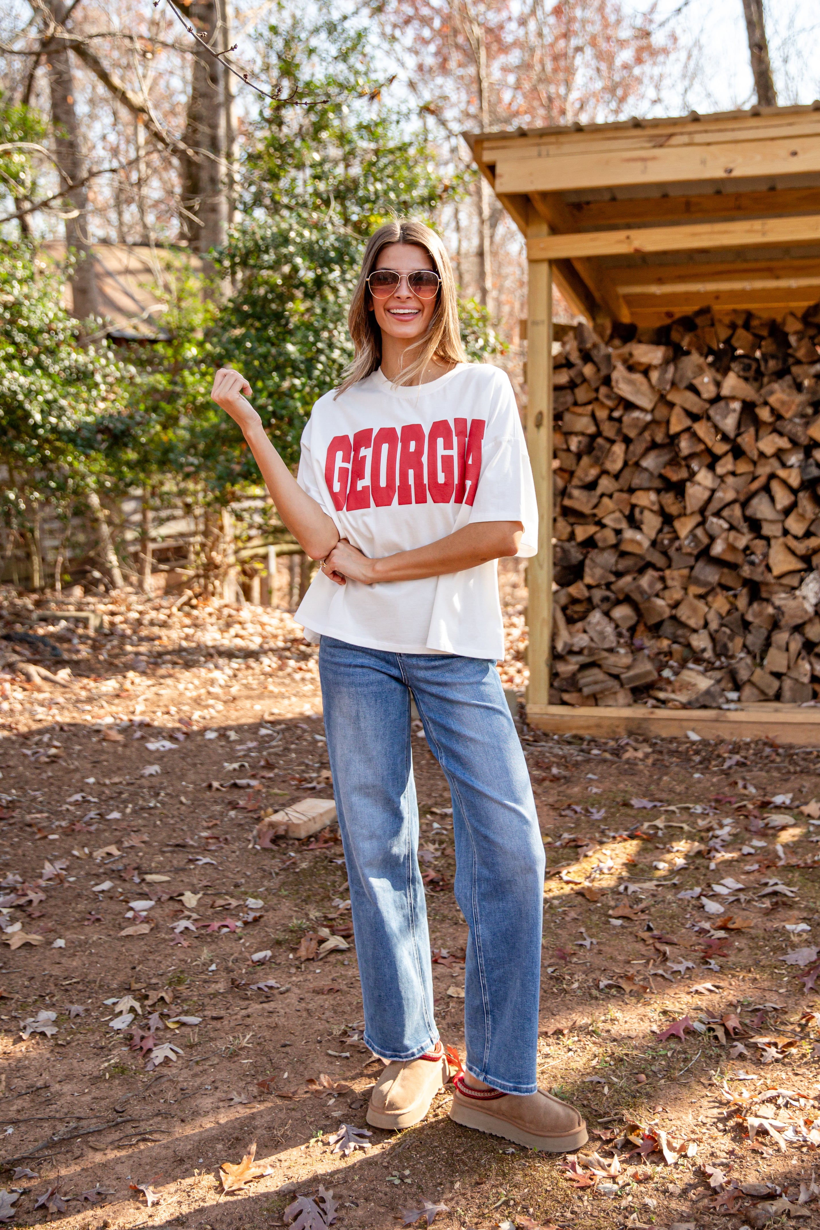 Woman wearing a white t-shirt with &