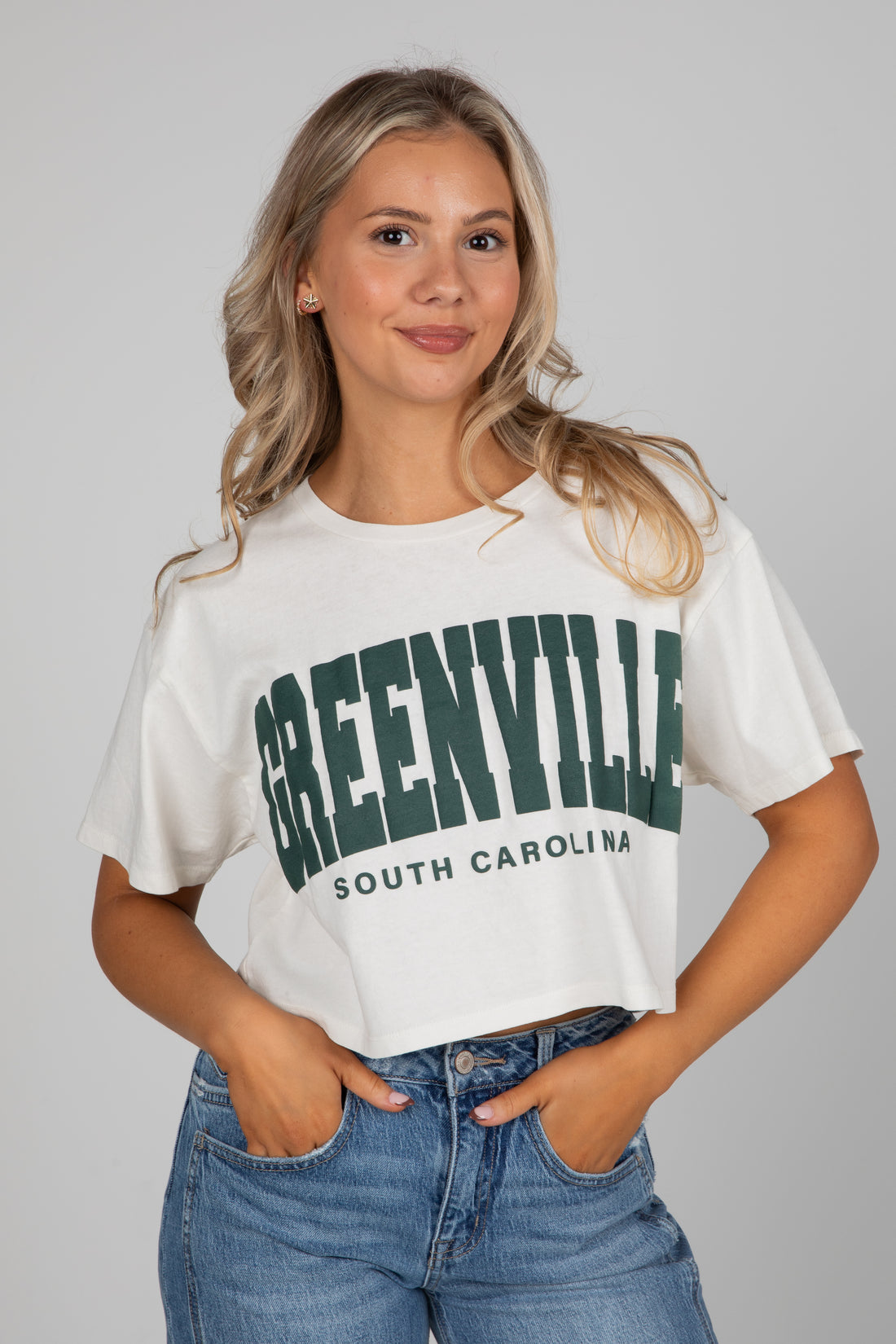 Woman wearing a white t-shirt with &