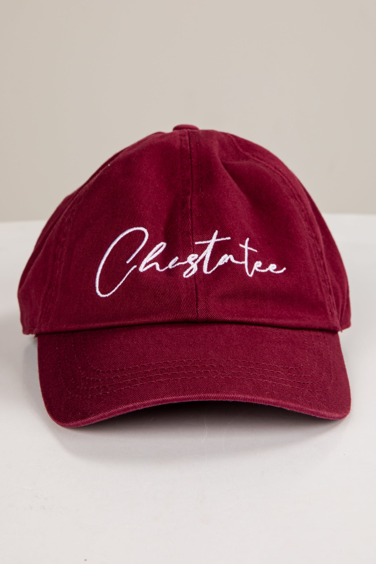 Maroon cap with &