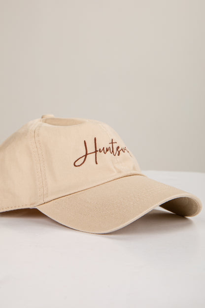 Beige cap with &