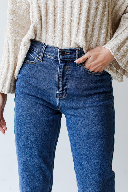 model wearing dark wash Mom Jeans
