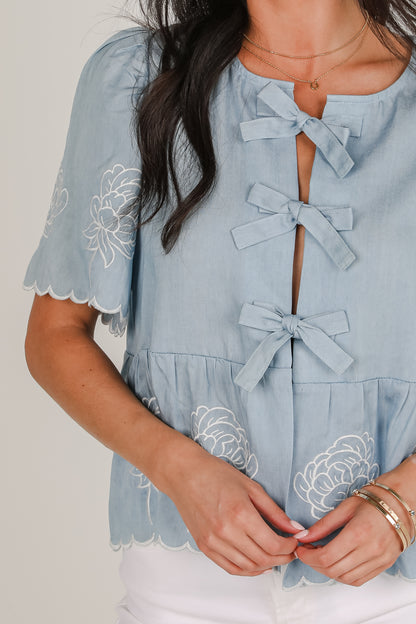 Dreams Unfolding Denim Floral Embroidered Bow Blouse