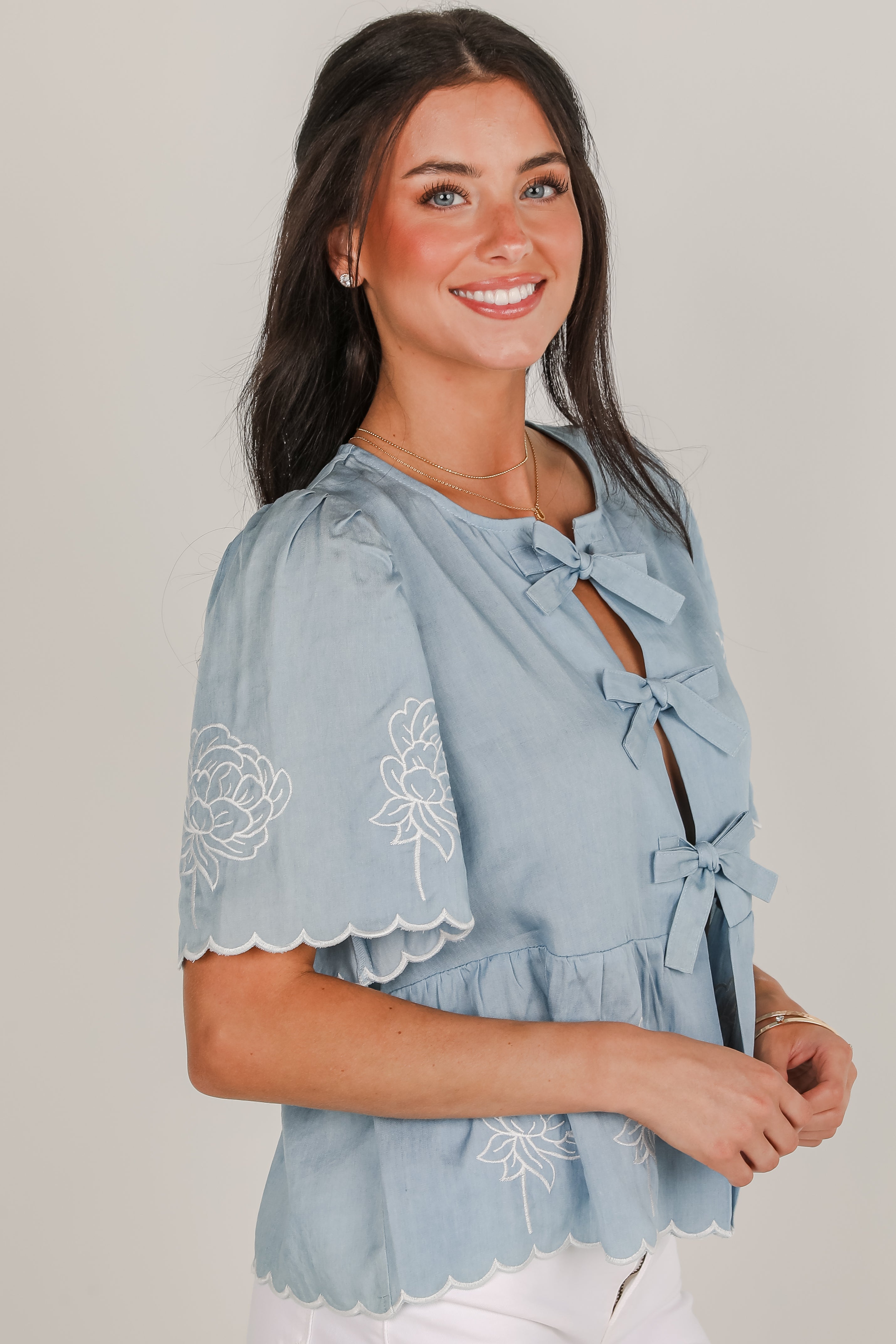 Dreams Unfolding Denim Floral Embroidered Bow Blouse